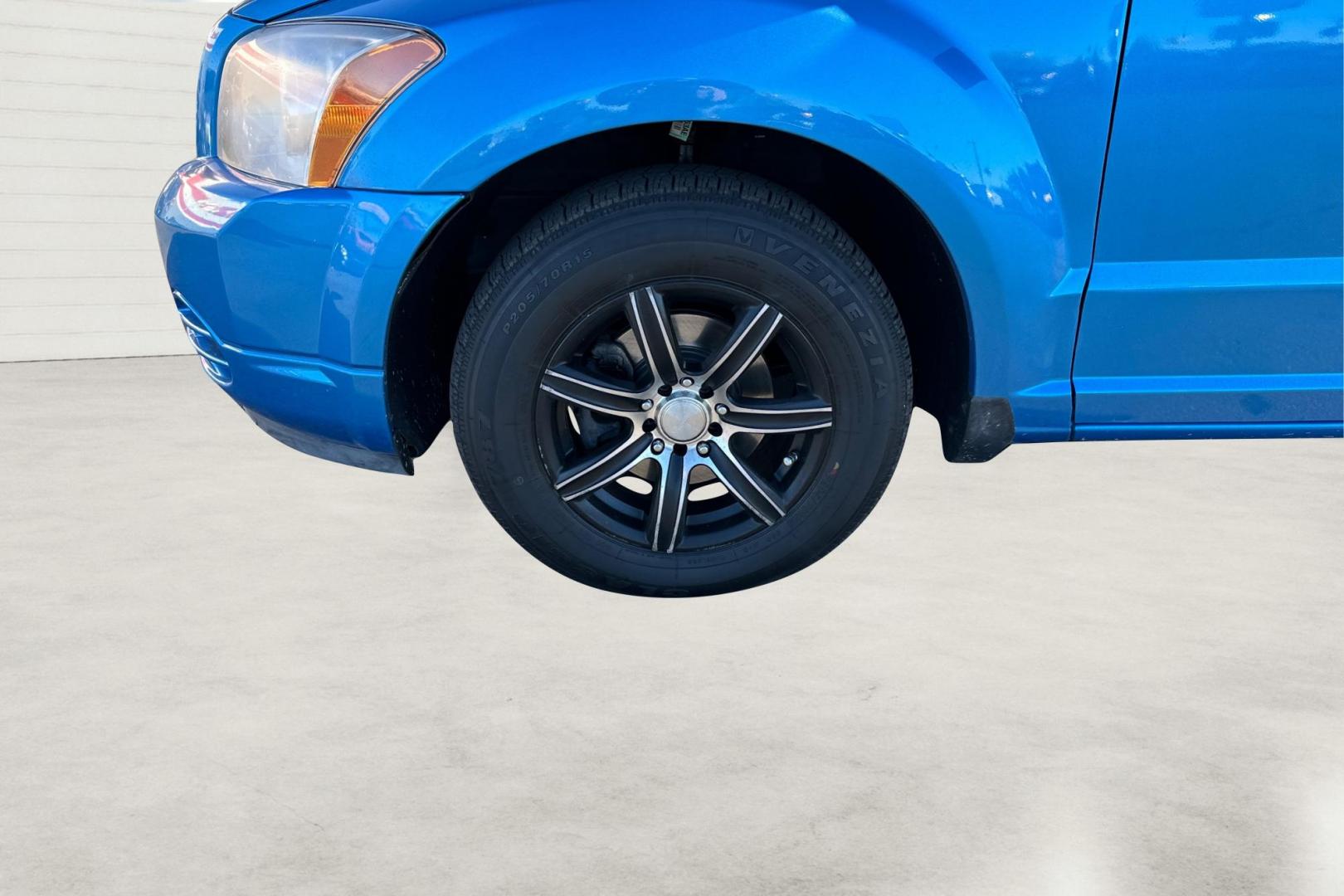 2009 Blue Dodge Caliber SE (1B3HB28A69D) with an 2.0L L4 DOHC 16V engine, Automatic, CVT transmission, located at 344 S Washington Blvd, Ogden, UT, 84404, (801) 399-1799, 41.255482, -111.970848 - Photo#12