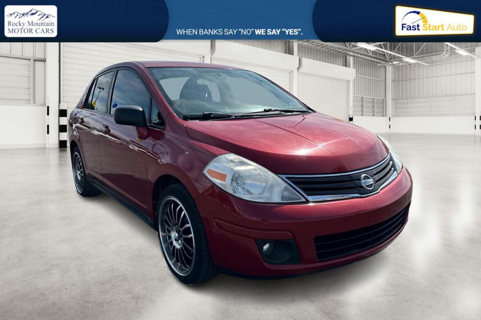 2010 Red Nissan Versa 1.8 S Sedan (3N1BC1AP2AL) with an 1.8L L4 DOHC 16V engine, Automatic, 4-Spd w/Overdrive transmission, located at 7755 State Street, Midvale, UT, 84047, (801) 753-9063, 40.610329, -111.890656 - Photo#0