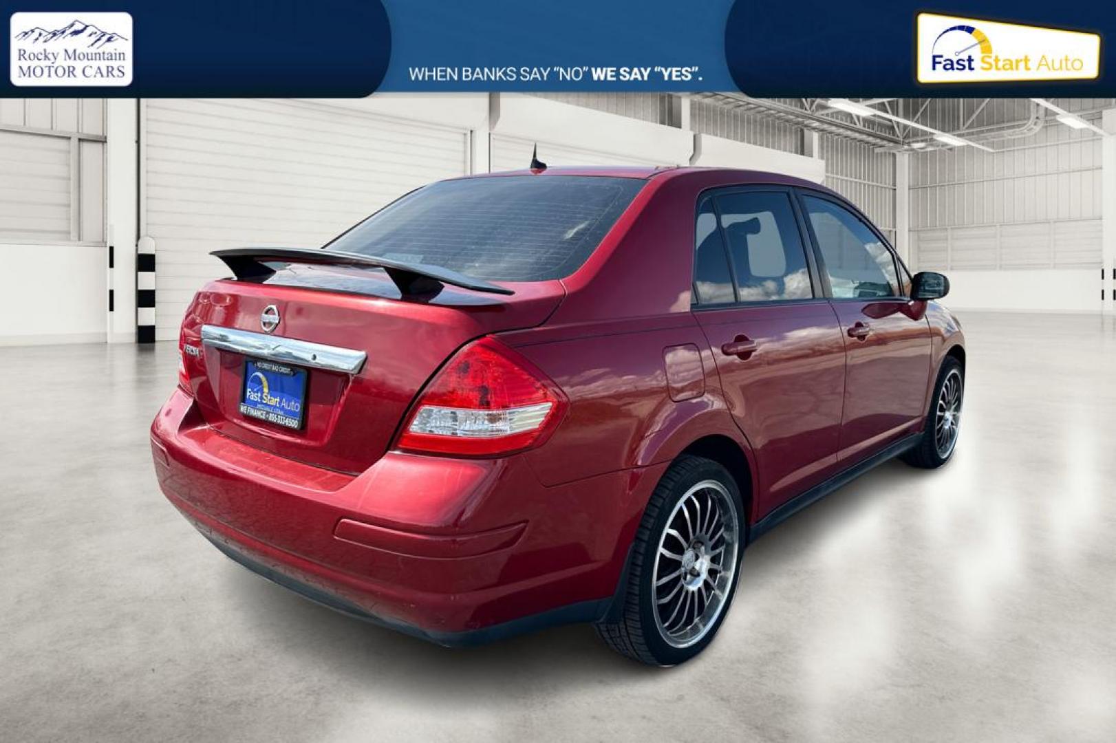 2010 Red Nissan Versa 1.8 S Sedan (3N1BC1AP2AL) with an 1.8L L4 DOHC 16V engine, Automatic, 4-Spd w/Overdrive transmission, located at 7755 State Street, Midvale, UT, 84047, (801) 753-9063, 40.610329, -111.890656 - Photo#2