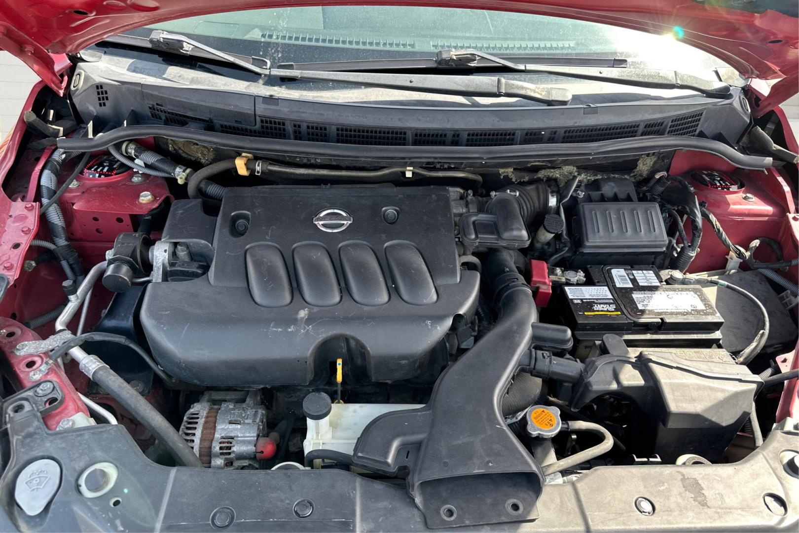 2010 Red Nissan Versa 1.8 S Sedan (3N1BC1AP2AL) with an 1.8L L4 DOHC 16V engine, Automatic, 4-Spd w/Overdrive transmission, located at 7755 State Street, Midvale, UT, 84047, (801) 753-9063, 40.610329, -111.890656 - Photo#10