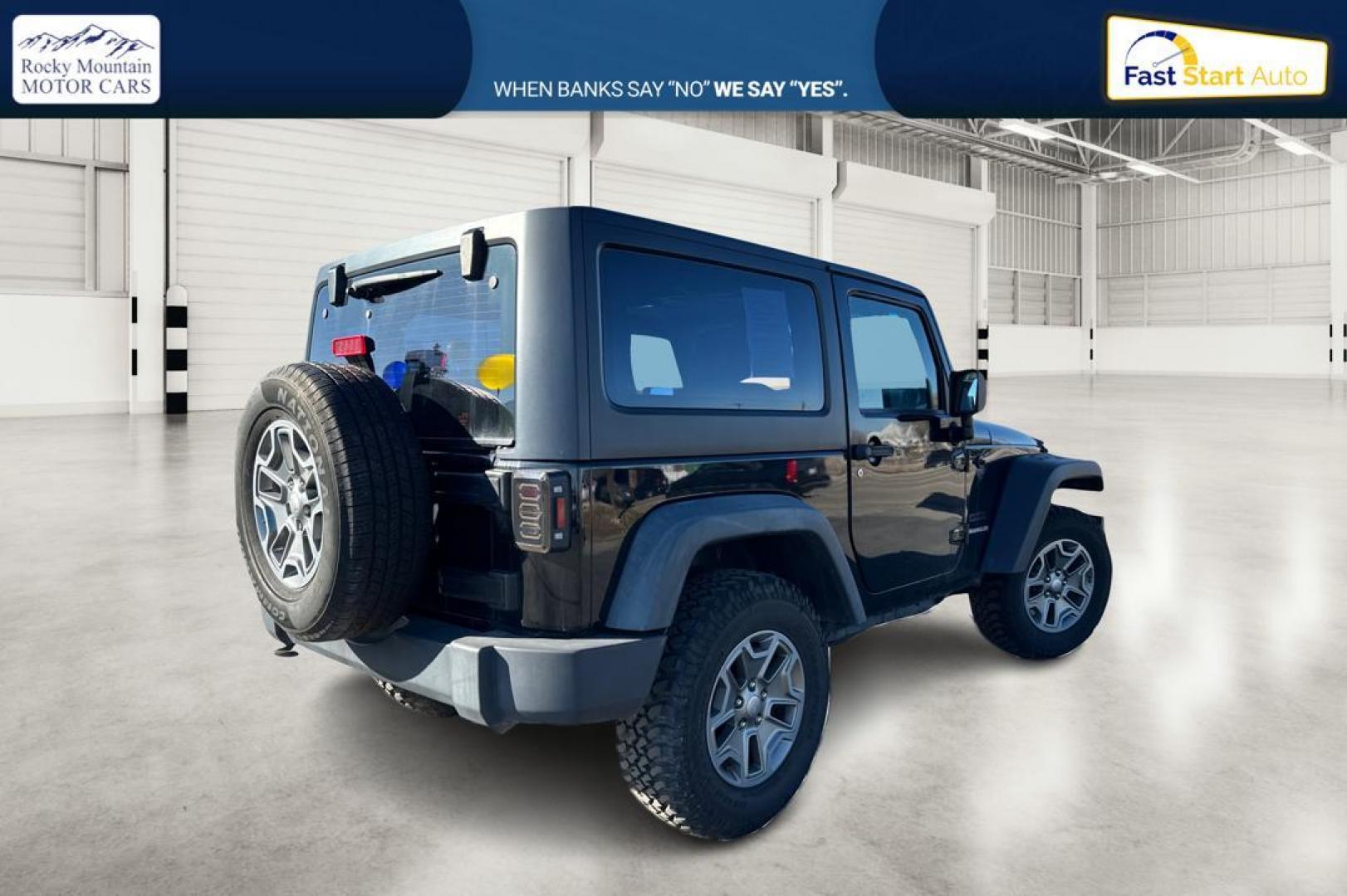 2011 Black Jeep Wrangler Sport 4WD (1J4AA2D12BL) with an 3.8L V6 OHV 12V engine, Automatic, 4-Spd w/Overdrive transmission, located at 767 S State Road, Pleasant Grove, UT, 84062, (801) 785-1058, 40.354839, -111.736687 - Photo#2