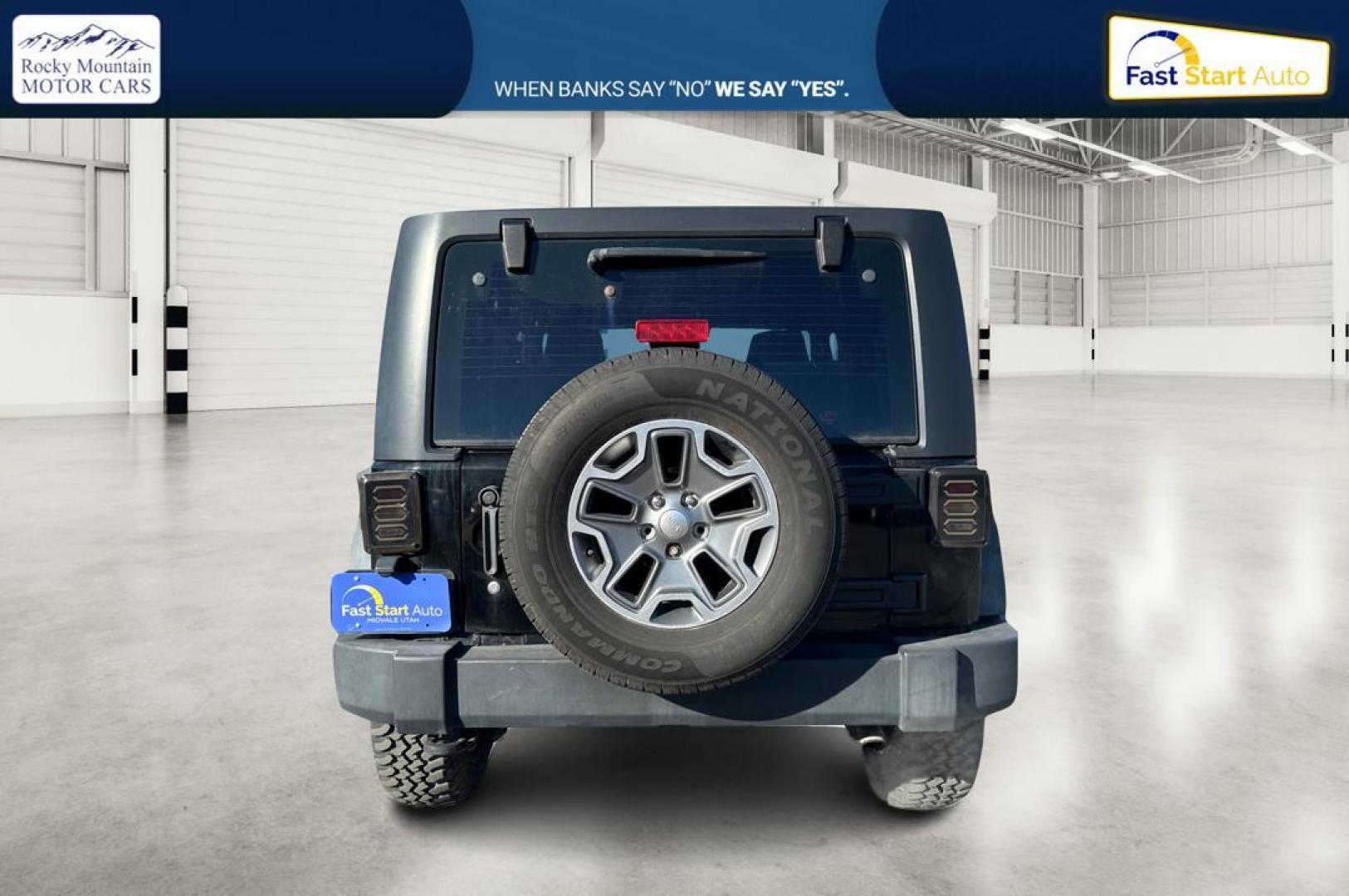 2011 Black Jeep Wrangler Sport 4WD (1J4AA2D12BL) with an 3.8L V6 OHV 12V engine, Automatic, 4-Spd w/Overdrive transmission, located at 767 S State Road, Pleasant Grove, UT, 84062, (801) 785-1058, 40.354839, -111.736687 - Photo#4