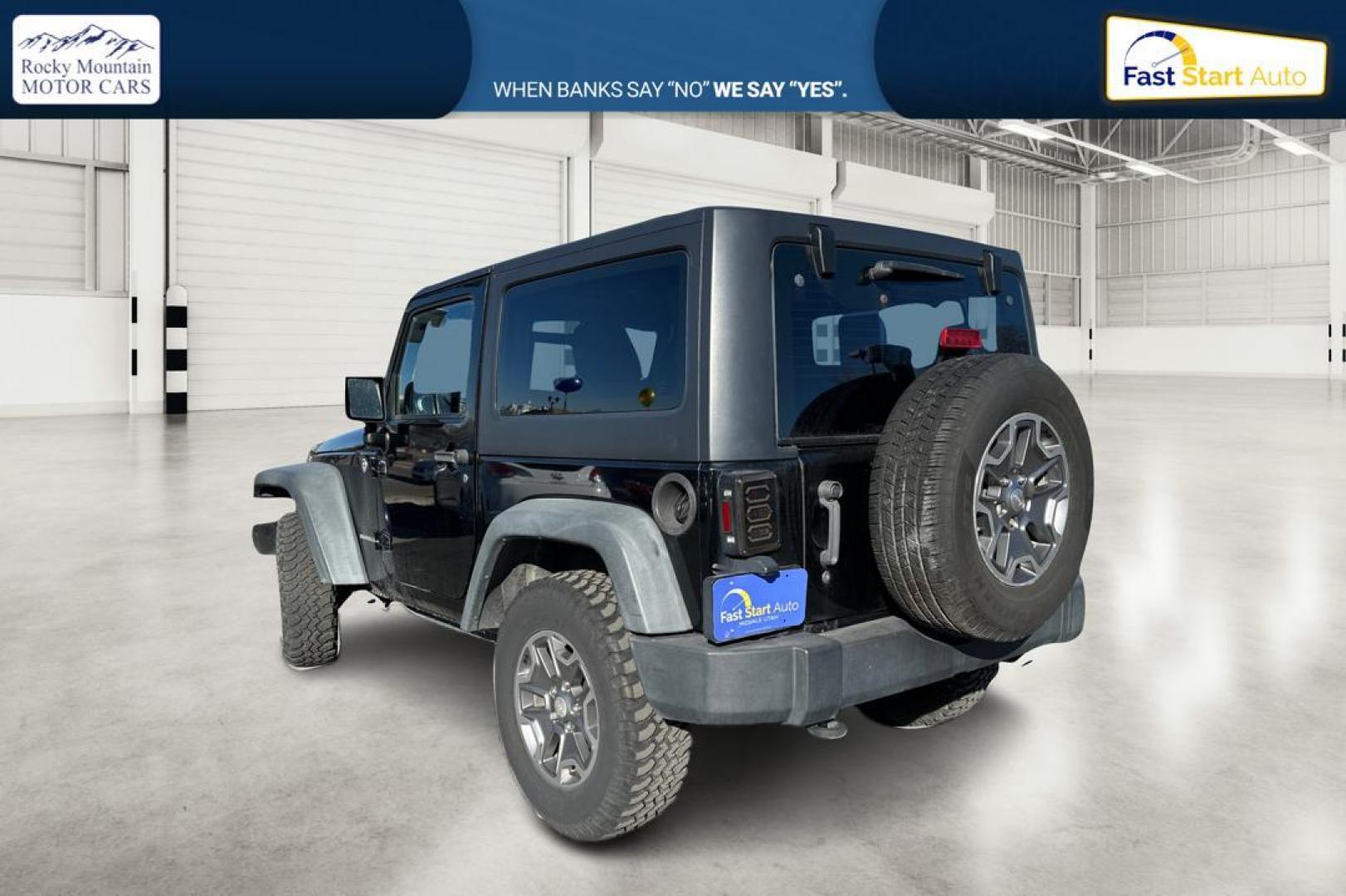 2011 Black Jeep Wrangler Sport 4WD (1J4AA2D12BL) with an 3.8L V6 OHV 12V engine, Automatic, 4-Spd w/Overdrive transmission, located at 767 S State Road, Pleasant Grove, UT, 84062, (801) 785-1058, 40.354839, -111.736687 - Photo#5