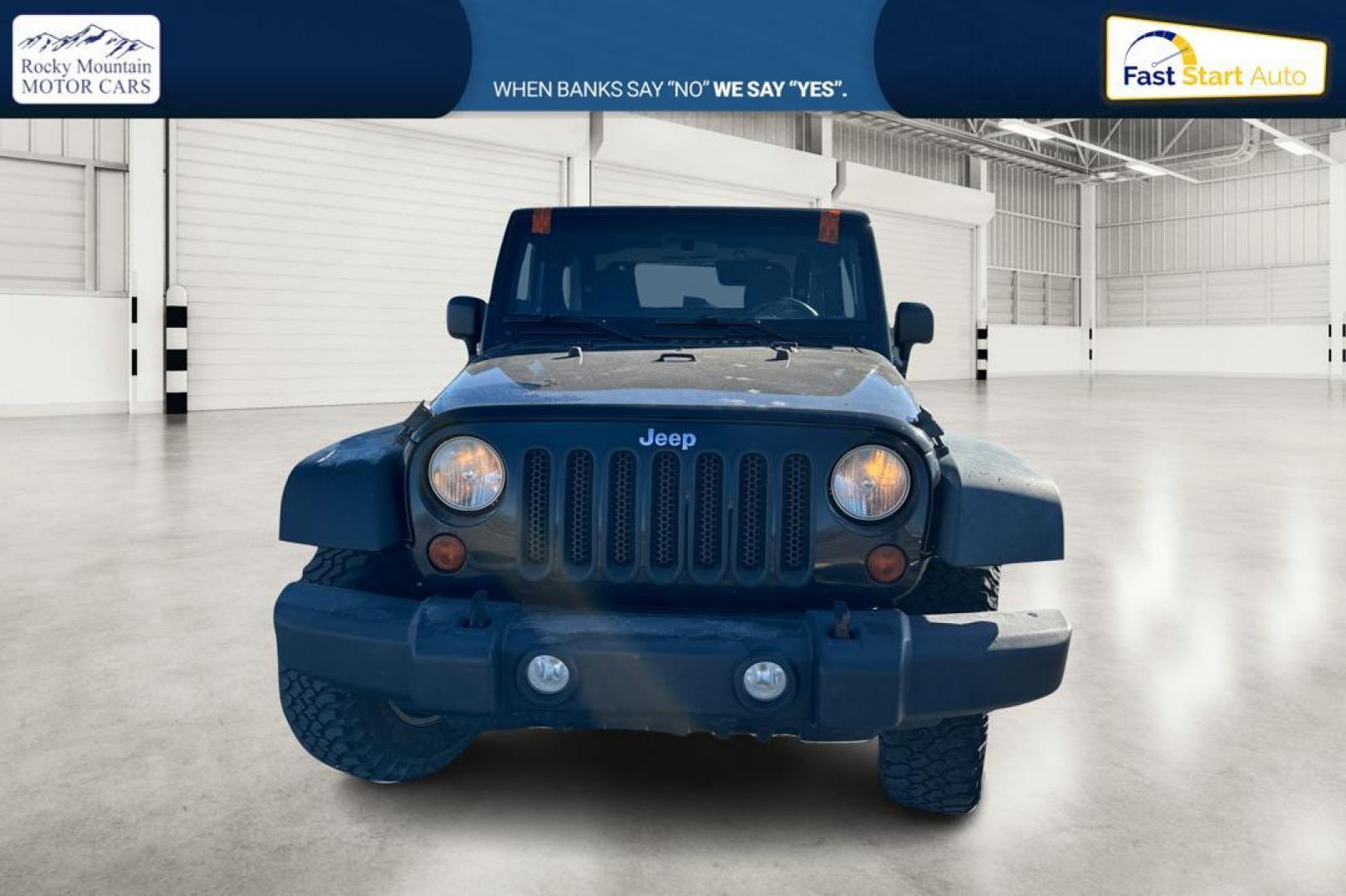 2011 Black Jeep Wrangler Sport 4WD (1J4AA2D12BL) with an 3.8L V6 OHV 12V engine, Automatic, 4-Spd w/Overdrive transmission, located at 767 S State Road, Pleasant Grove, UT, 84062, (801) 785-1058, 40.354839, -111.736687 - Photo#9
