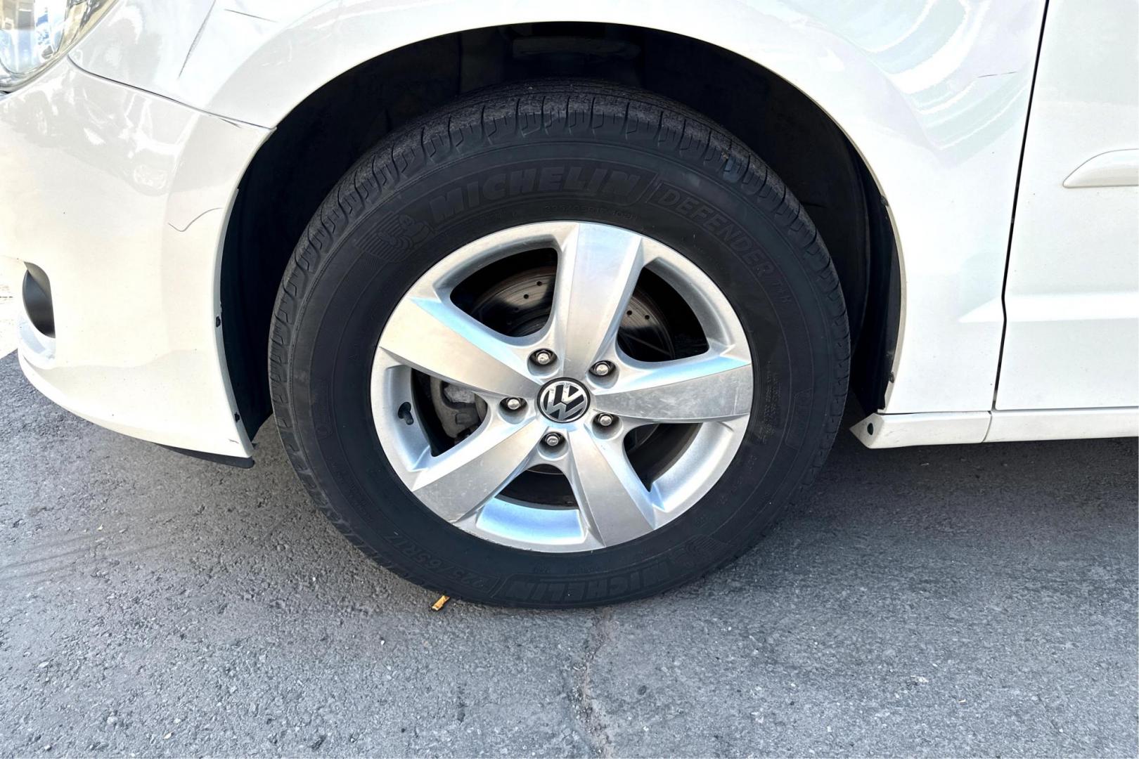 2011 White Volkswagen Routan SE (2V4RW3DG8BR) with an 3.6L V6 DOHC 24V engine, 6-Speed Automatic transmission, located at 344 S Washington Blvd, Ogden, UT, 84404, (801) 399-1799, 41.255482, -111.970848 - Photo#9