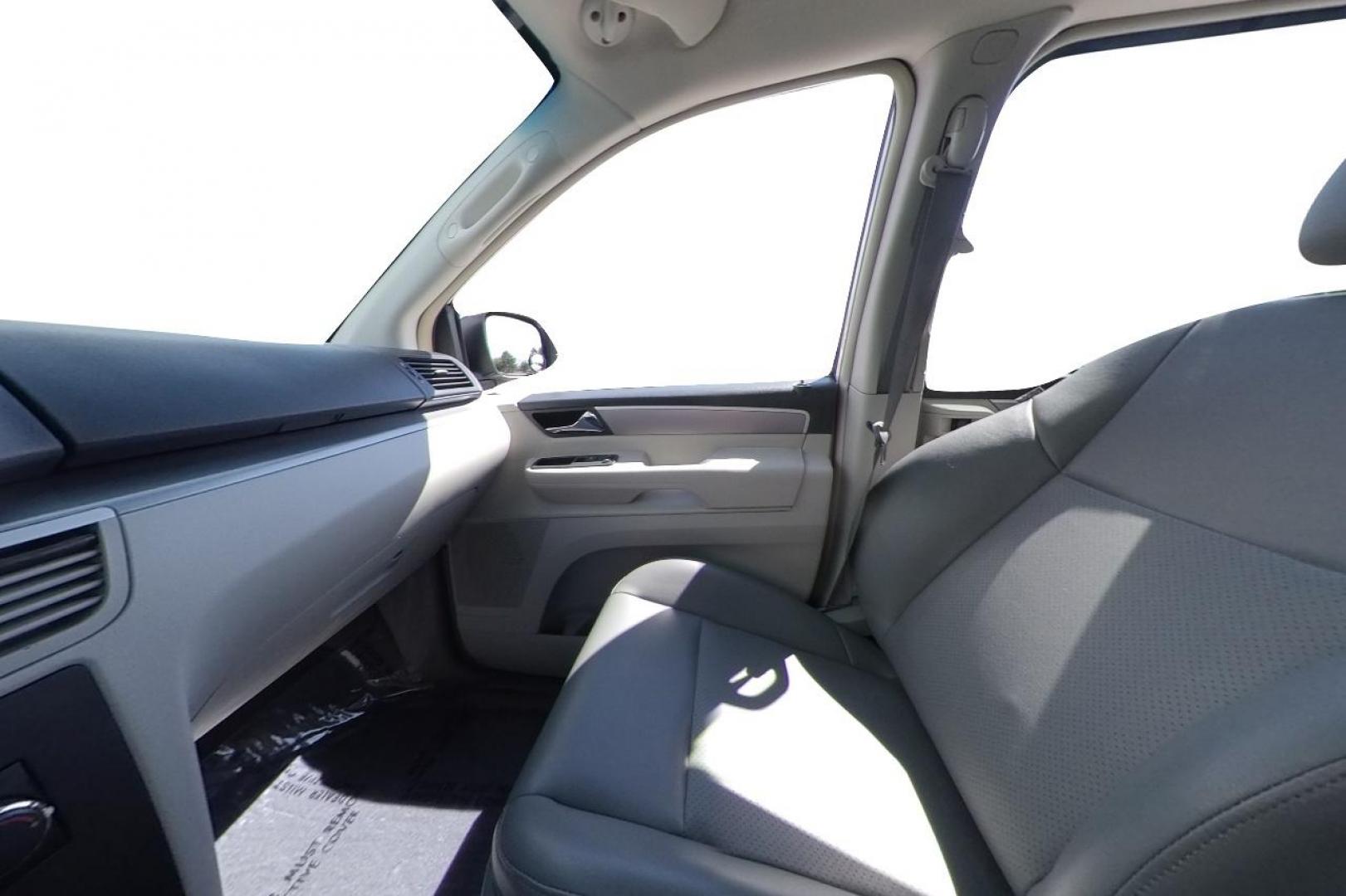 2011 White Volkswagen Routan SE (2V4RW3DG8BR) with an 3.6L V6 DOHC 24V engine, 6-Speed Automatic transmission, located at 344 S Washington Blvd, Ogden, UT, 84404, (801) 399-1799, 41.255482, -111.970848 - Photo#13