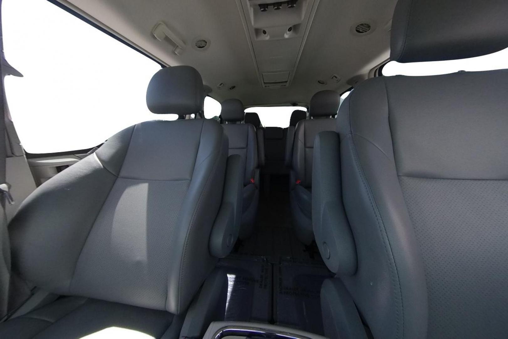 2011 White Volkswagen Routan SE (2V4RW3DG8BR) with an 3.6L V6 DOHC 24V engine, 6-Speed Automatic transmission, located at 344 S Washington Blvd, Ogden, UT, 84404, (801) 399-1799, 41.255482, -111.970848 - Photo#14