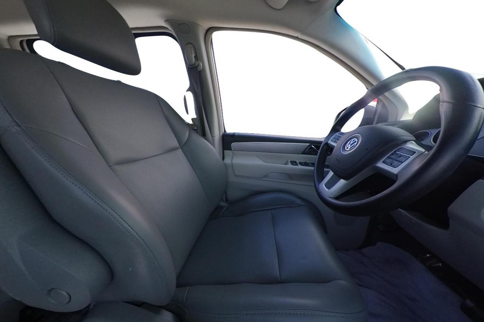 2011 White Volkswagen Routan SE (2V4RW3DG8BR) with an 3.6L V6 DOHC 24V engine, 6-Speed Automatic transmission, located at 344 S Washington Blvd, Ogden, UT, 84404, (801) 399-1799, 41.255482, -111.970848 - Photo#15