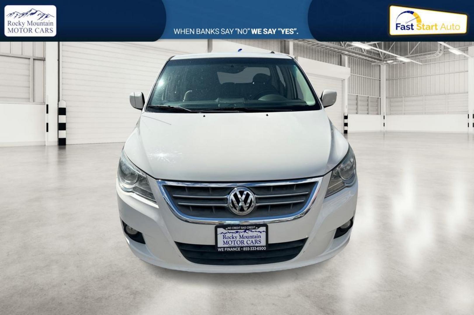 2011 White Volkswagen Routan SE (2V4RW3DG8BR) with an 3.6L V6 DOHC 24V engine, 6-Speed Automatic transmission, located at 344 S Washington Blvd, Ogden, UT, 84404, (801) 399-1799, 41.255482, -111.970848 - Photo#7