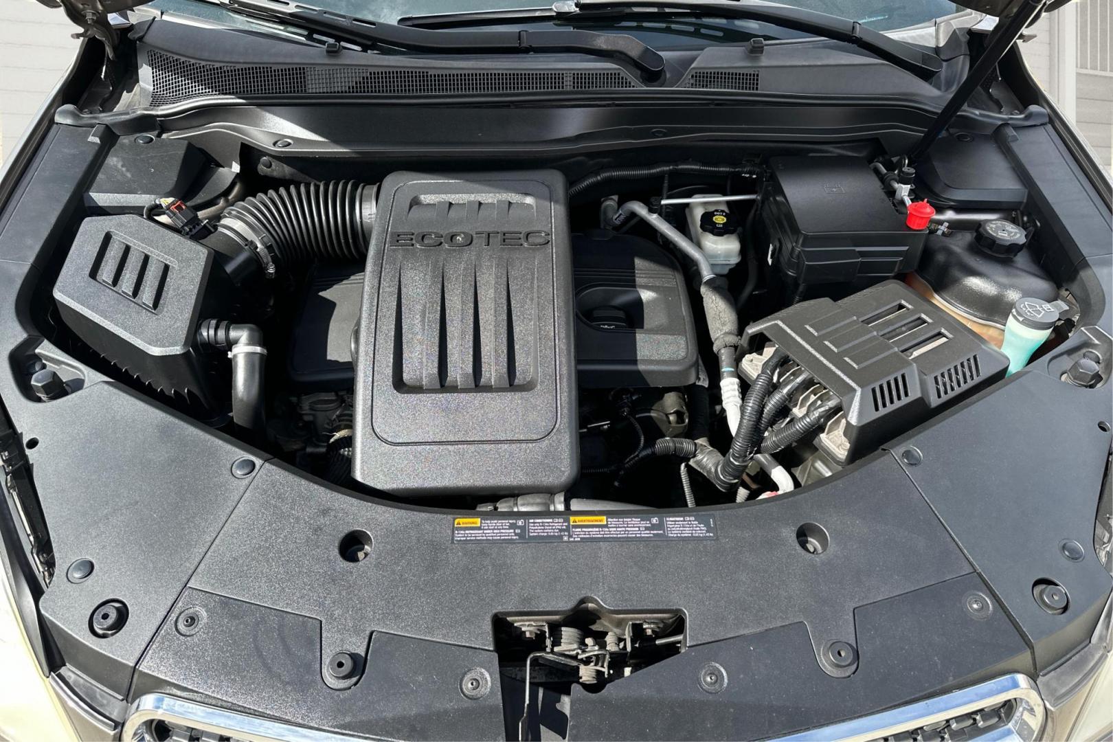 2012 Brown Chevrolet Equinox LTZ 2WD (2GNALFEK3C6) with an 2.4L L4 DOHC 16V engine, 6-Speed Automatic transmission, located at 344 S Washington Blvd, Ogden, UT, 84404, (801) 399-1799, 41.255482, -111.970848 - Photo#10