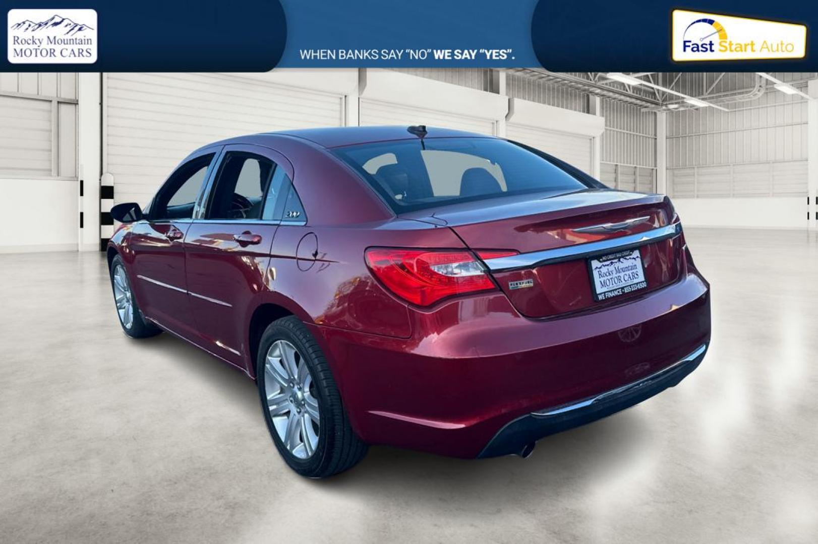 2012 Purple Chrysler 200 Touring (1C3CCBBG2CN) with an 3.6L V6 DOHC 24V FFV engine, 6-Speed Automatic transmission, located at 344 S Washington Blvd, Ogden, UT, 84404, (801) 399-1799, 41.255482, -111.970848 - Photo#5