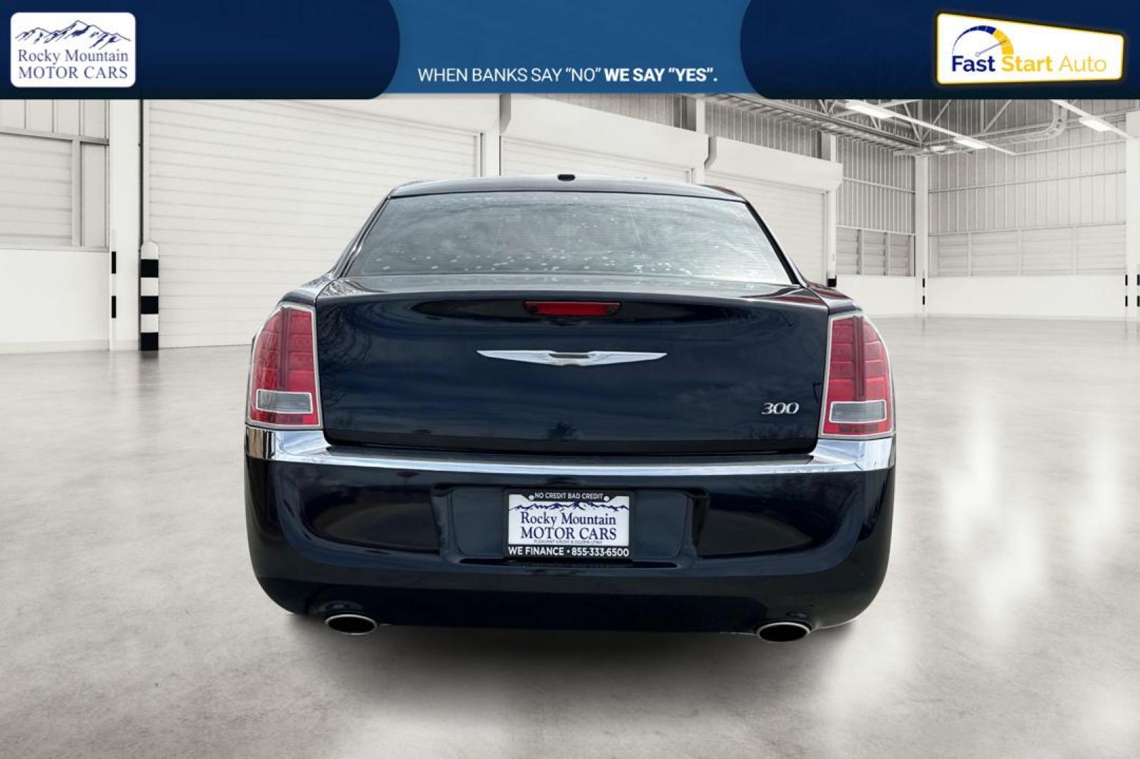 2012 Blue Chrysler 300 Limited RWD (2C3CCACG8CH) with an 3.6L V6 SOHC 24V engine, 5-Speed Automatic transmission, located at 767 S State Road, Pleasant Grove, UT, 84062, (801) 785-1058, 40.354839, -111.736687 - Photo#4