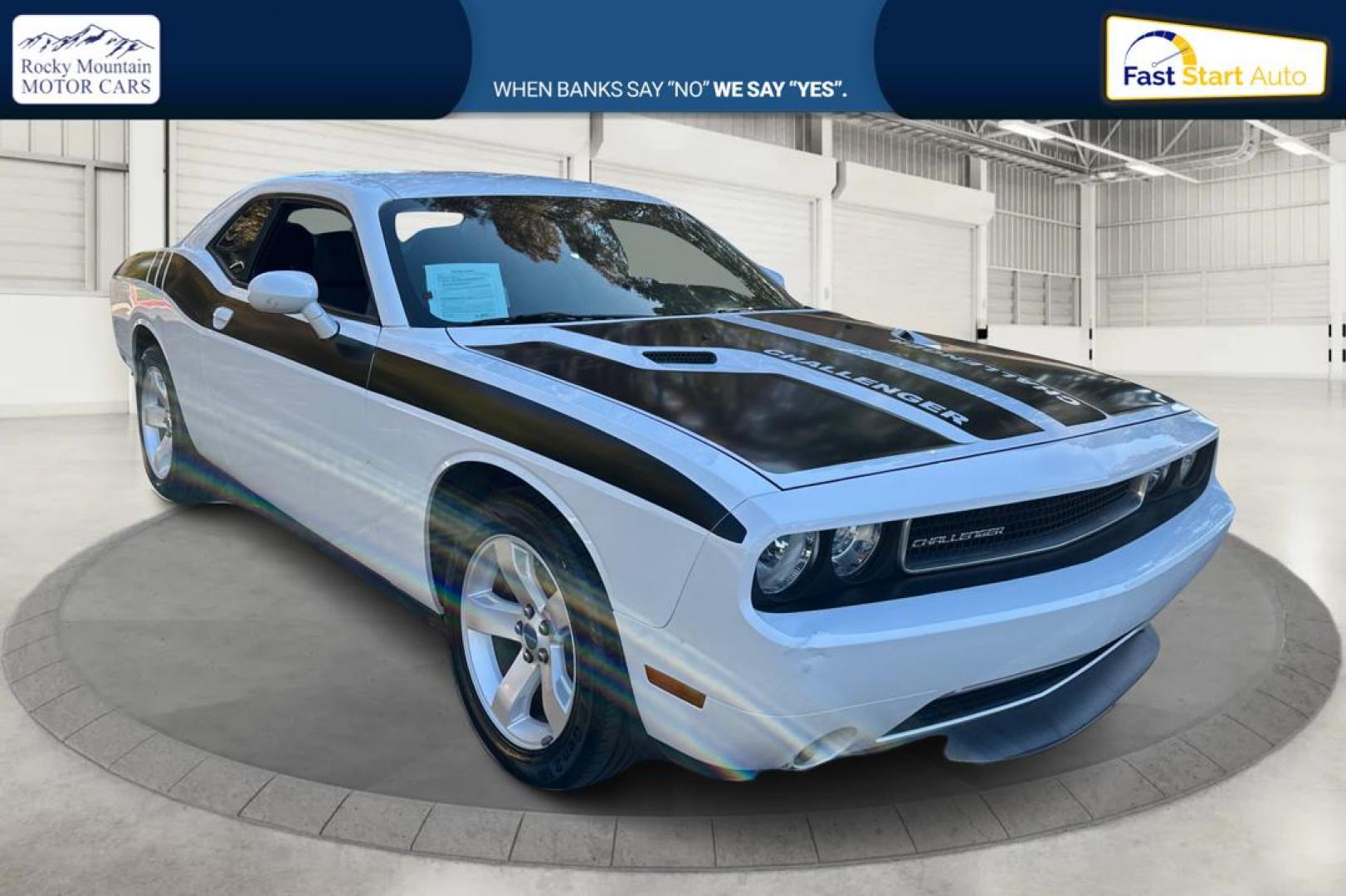 2012 White Dodge Challenger SXT (2C3CDYAG7CH) with an 3.6L V6 DOHC 24V engine, 4-Speed Automatic transmission, located at 767 S State Road, Pleasant Grove, UT, 84062, (801) 785-1058, 40.354839, -111.736687 - Photo#0