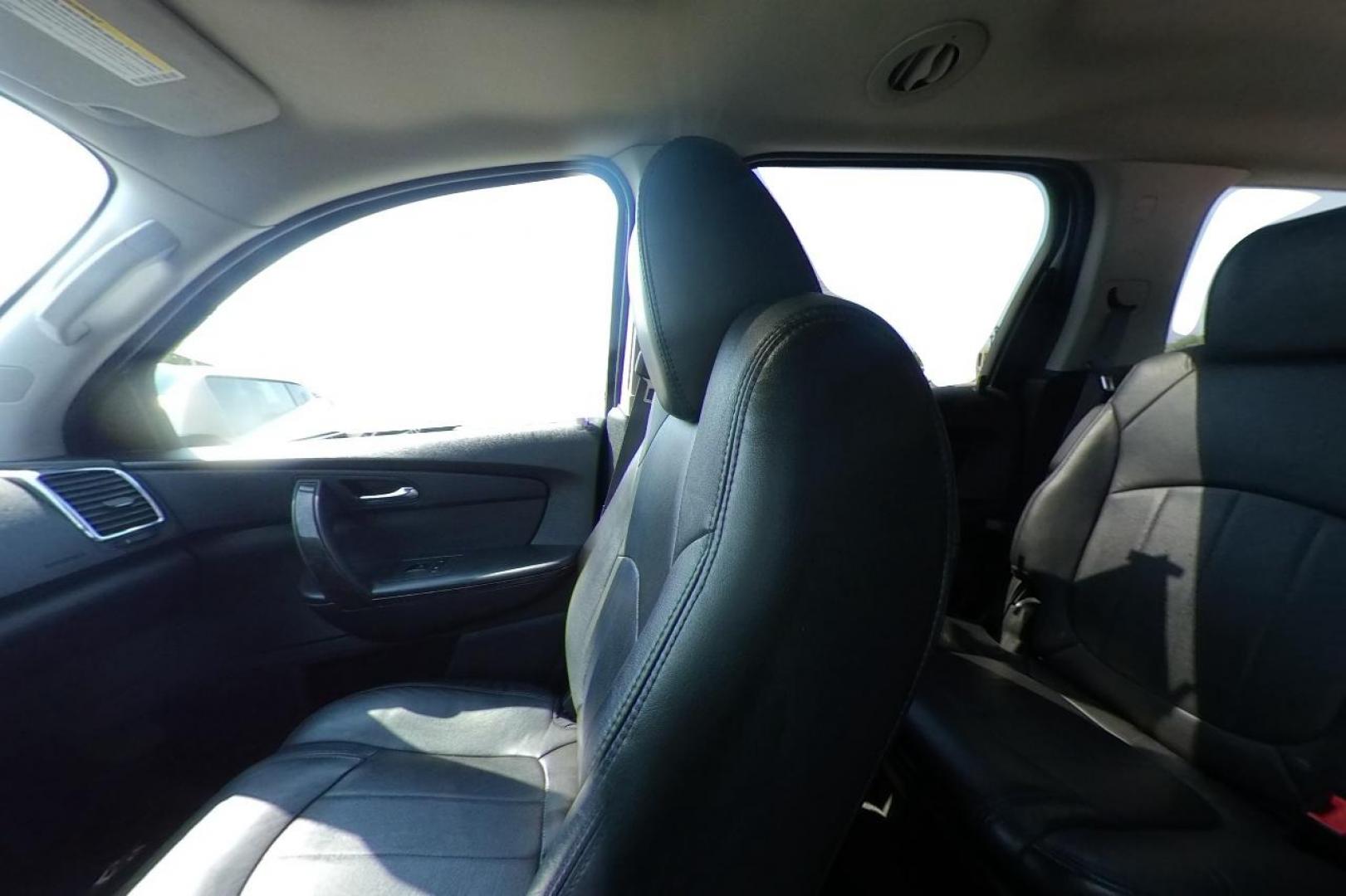 2012 White GMC Acadia Denali FWD (1GKKRTED8CJ) with an 3.6L V6 DOHC 24V engine, 6-Speed Automatic transmission, located at 767 S State Road, Pleasant Grove, UT, 84062, (801) 785-1058, 40.354839, -111.736687 - Photo#14