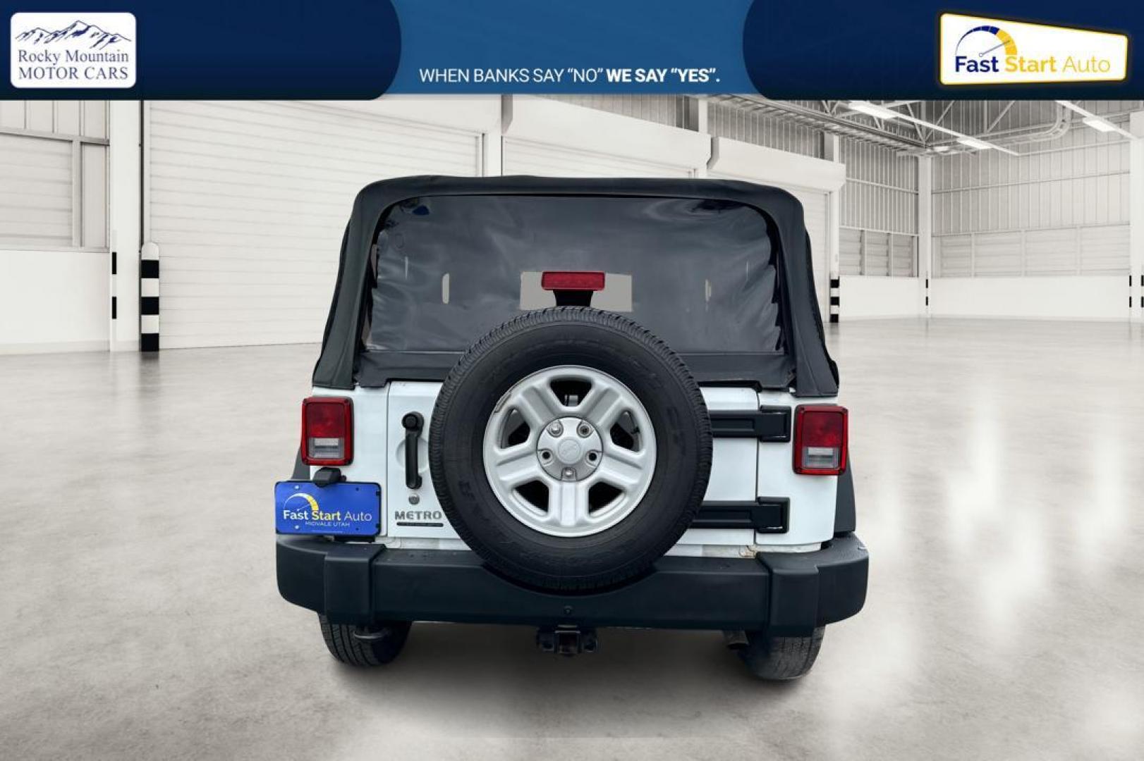 2012 White Jeep Wrangler Sport 4WD (1C4AJWAG0CL) with an 3.6L V6 DOHC 24V FFV engine, Automatic, 5-Spd transmission, located at 344 S Washington Blvd, Ogden, UT, 84404, (801) 399-1799, 41.255482, -111.970848 - Photo#4