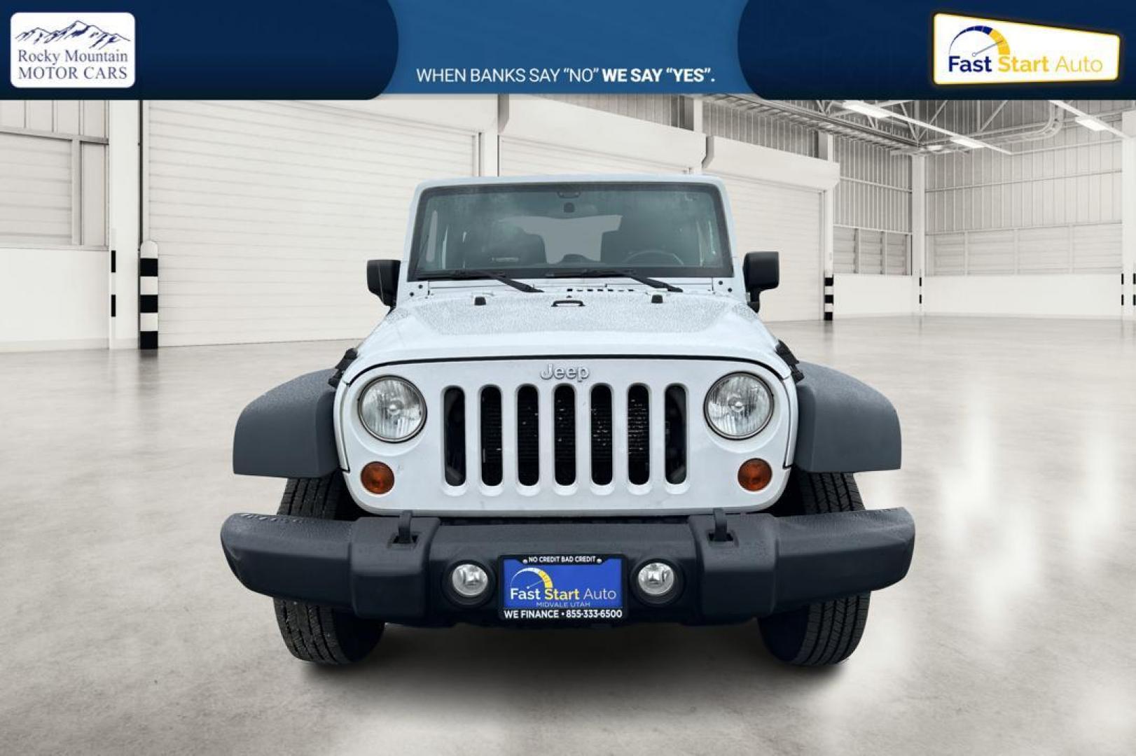 2012 White Jeep Wrangler Sport 4WD (1C4AJWAG0CL) with an 3.6L V6 DOHC 24V FFV engine, Automatic, 5-Spd transmission, located at 344 S Washington Blvd, Ogden, UT, 84404, (801) 399-1799, 41.255482, -111.970848 - Photo#9