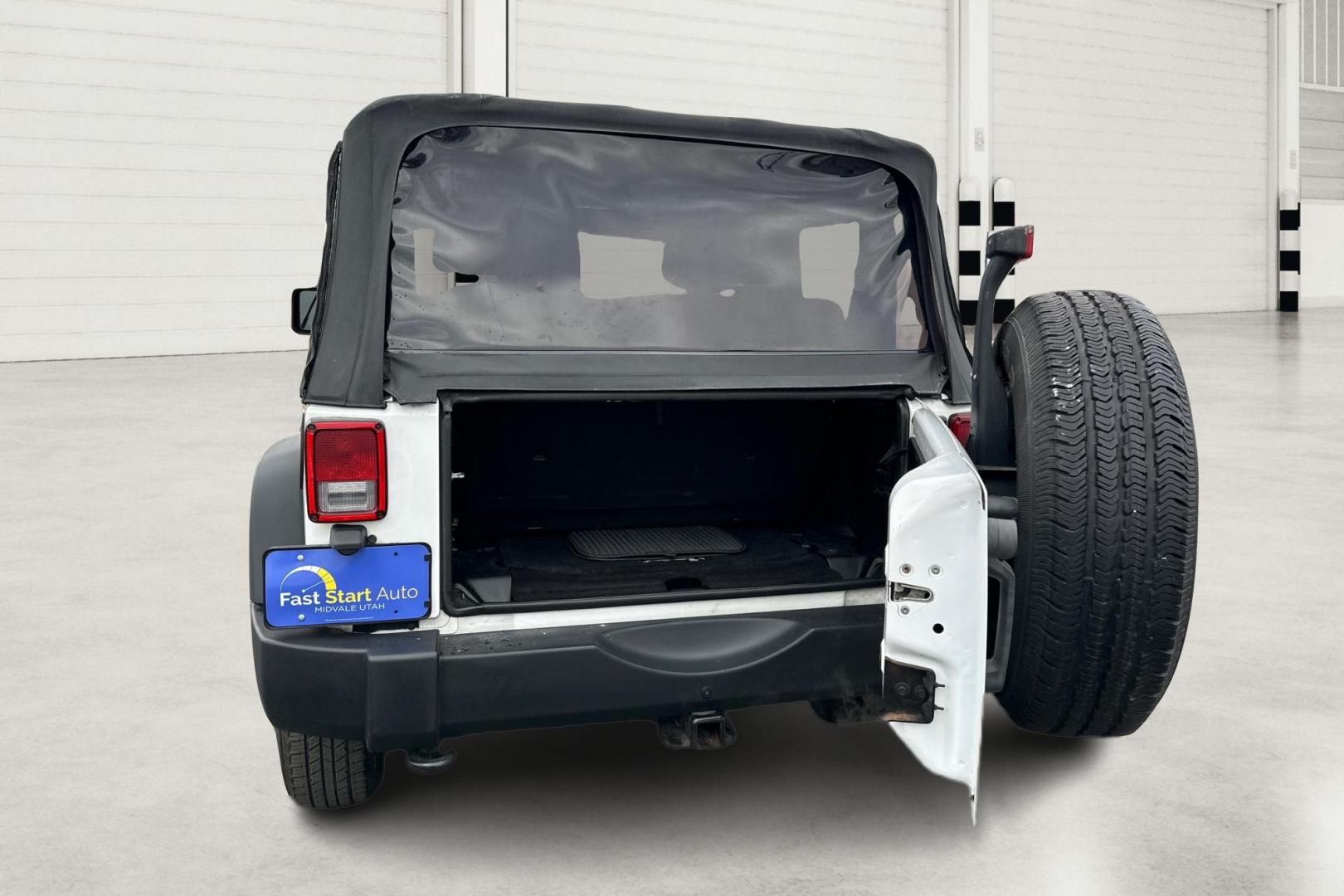 2012 White Jeep Wrangler Sport 4WD (1C4AJWAG0CL) with an 3.6L V6 DOHC 24V FFV engine, Automatic, 5-Spd transmission, located at 344 S Washington Blvd, Ogden, UT, 84404, (801) 399-1799, 41.255482, -111.970848 - Photo#13