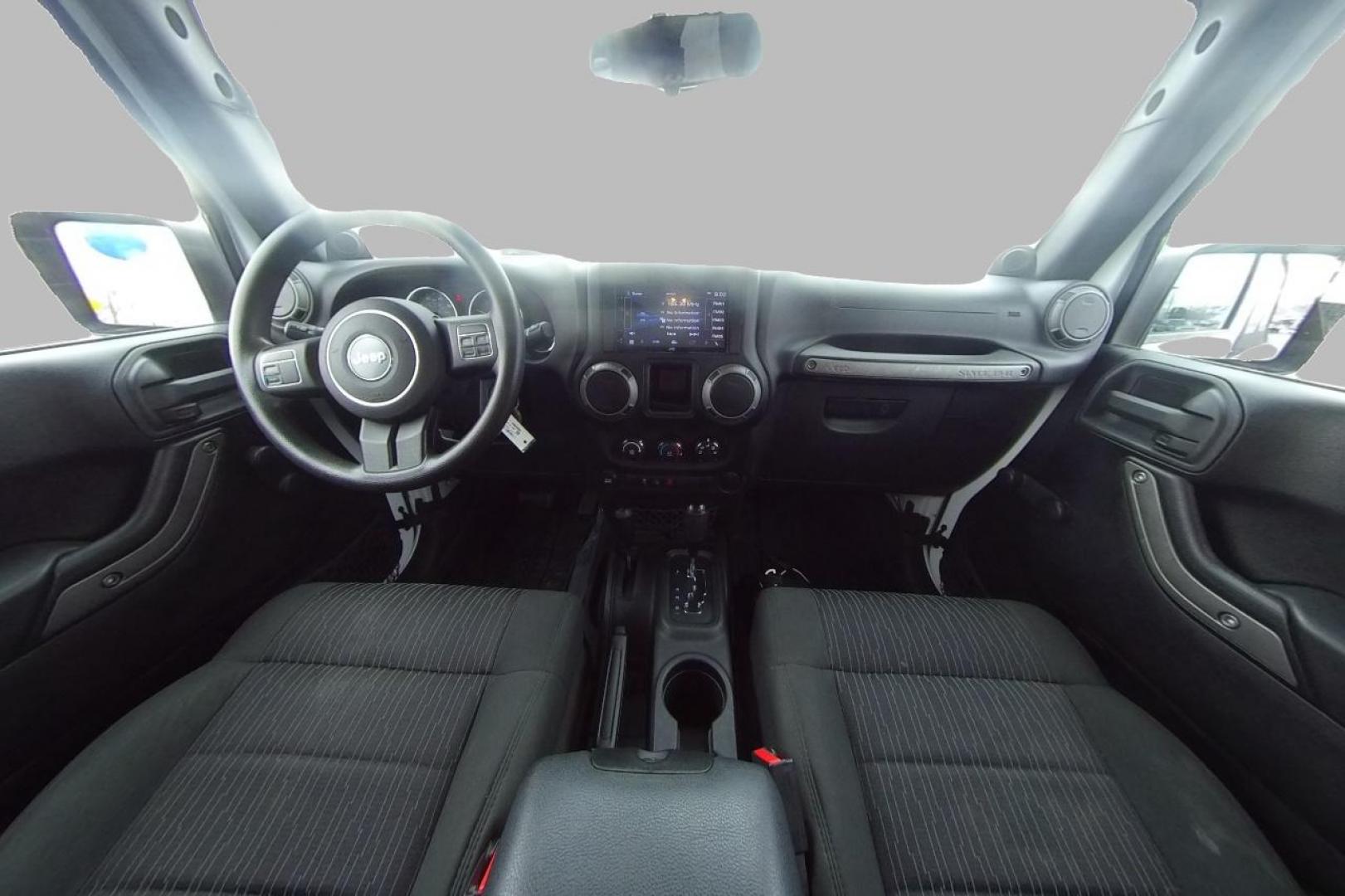 2012 White Jeep Wrangler Sport 4WD (1C4AJWAG0CL) with an 3.6L V6 DOHC 24V FFV engine, Automatic, 5-Spd transmission, located at 344 S Washington Blvd, Ogden, UT, 84404, (801) 399-1799, 41.255482, -111.970848 - Photo#16