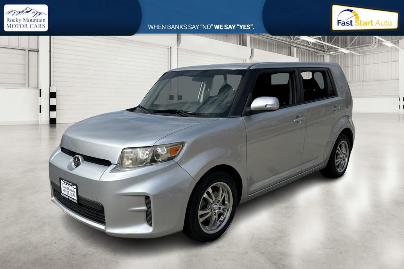 2012 Silver Scion xB 5-Door Wagon 5-Spd MT (JTLZE4FE4C1) with an 2.4L L4 DOHC 16V engine, 5-Speed Manual transmission, located at 344 S Washington Blvd, Ogden, UT, 84404, (801) 399-1799, 41.255482, -111.970848 - Photo#8