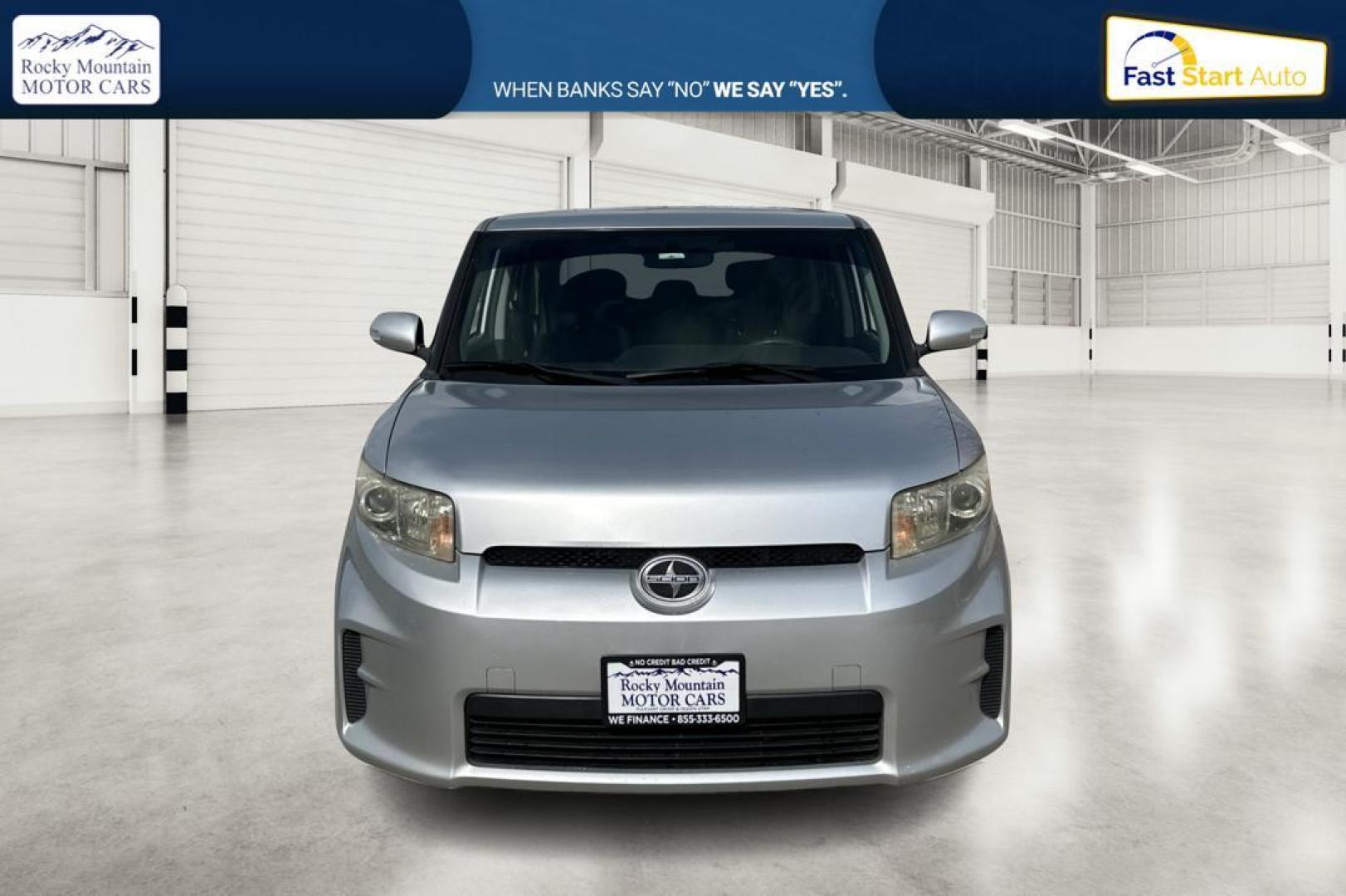 2012 Silver Scion xB 5-Door Wagon 5-Spd MT (JTLZE4FE4C1) with an 2.4L L4 DOHC 16V engine, 5-Speed Manual transmission, located at 344 S Washington Blvd, Ogden, UT, 84404, (801) 399-1799, 41.255482, -111.970848 - Photo#9