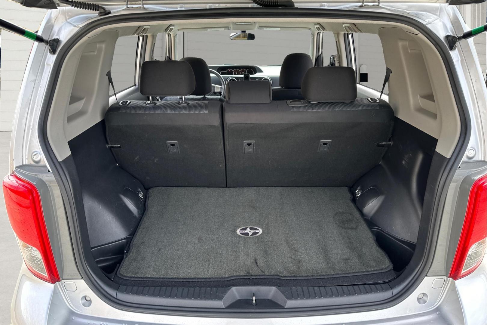 2012 Silver Scion xB 5-Door Wagon 5-Spd MT (JTLZE4FE4C1) with an 2.4L L4 DOHC 16V engine, 5-Speed Manual transmission, located at 344 S Washington Blvd, Ogden, UT, 84404, (801) 399-1799, 41.255482, -111.970848 - Photo#13