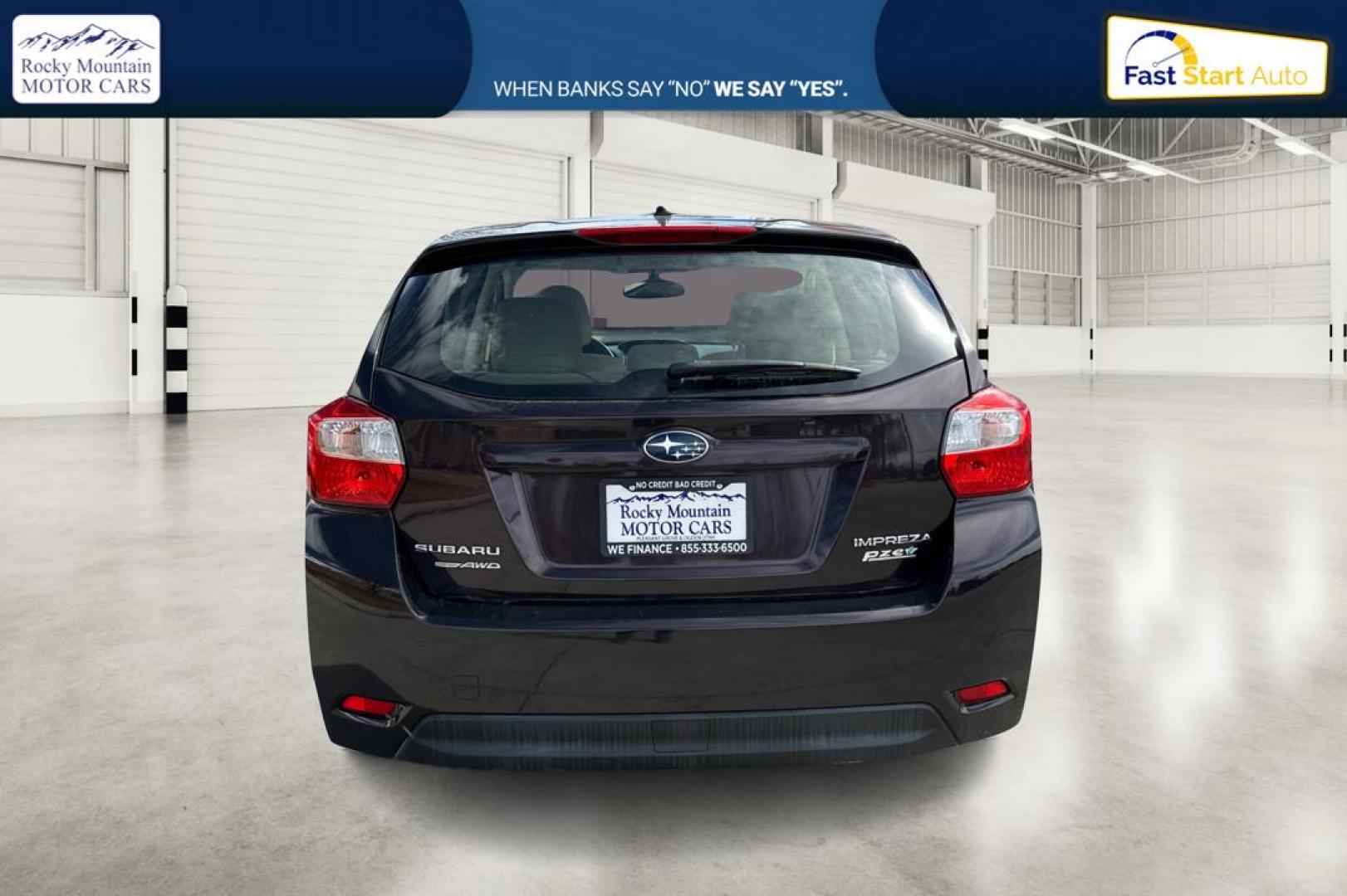 2012 Purple Subaru Impreza Premium 5-Door (JF1GPAB69CG) with an 2.0L H4 DOHC 16V engine, Continuously Variable Transmission transmission, located at 767 S State Road, Pleasant Grove, UT, 84062, (801) 785-1058, 40.354839, -111.736687 - Photo#4