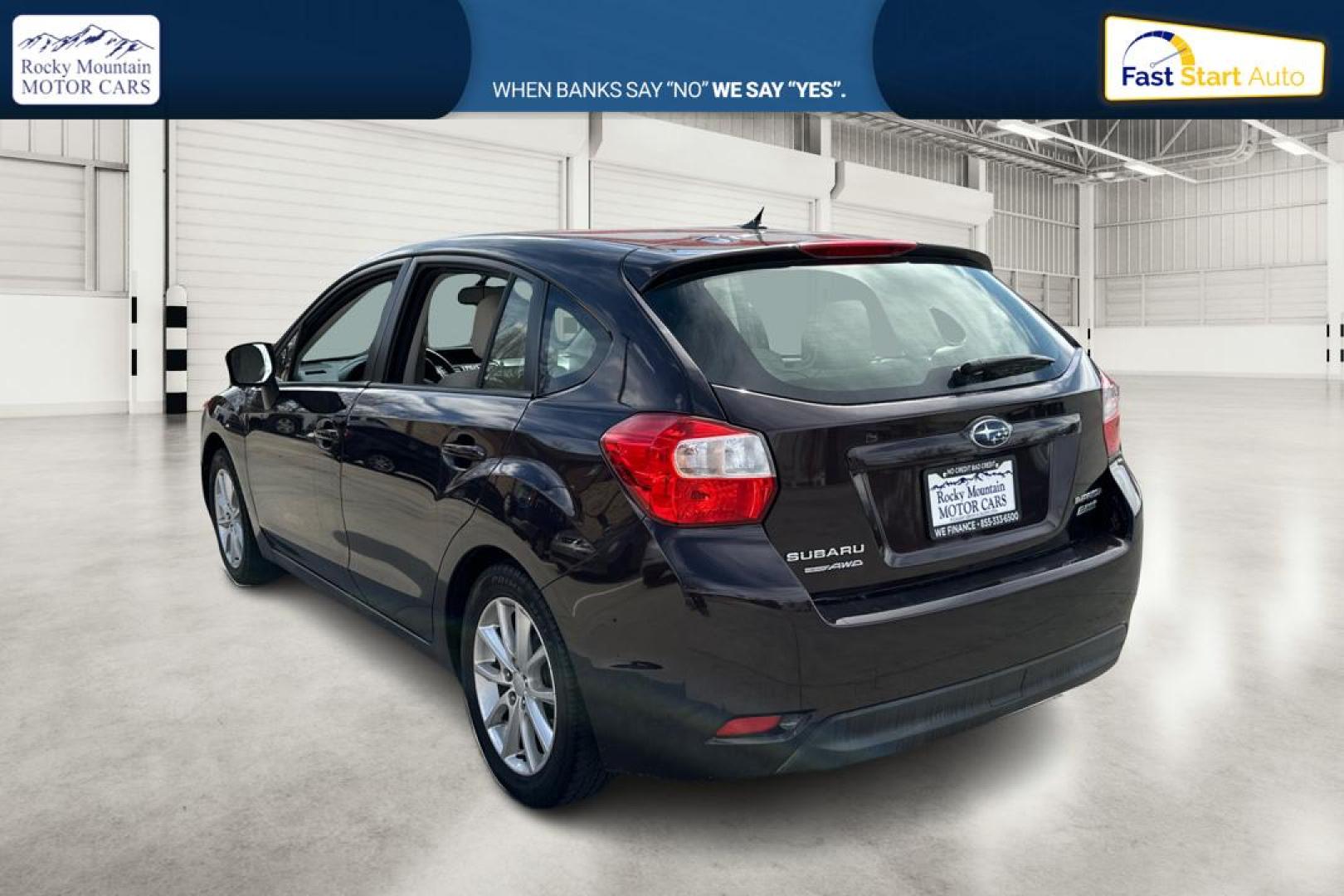 2012 Purple Subaru Impreza Premium 5-Door (JF1GPAB69CG) with an 2.0L H4 DOHC 16V engine, Continuously Variable Transmission transmission, located at 767 S State Road, Pleasant Grove, UT, 84062, (801) 785-1058, 40.354839, -111.736687 - Photo#5