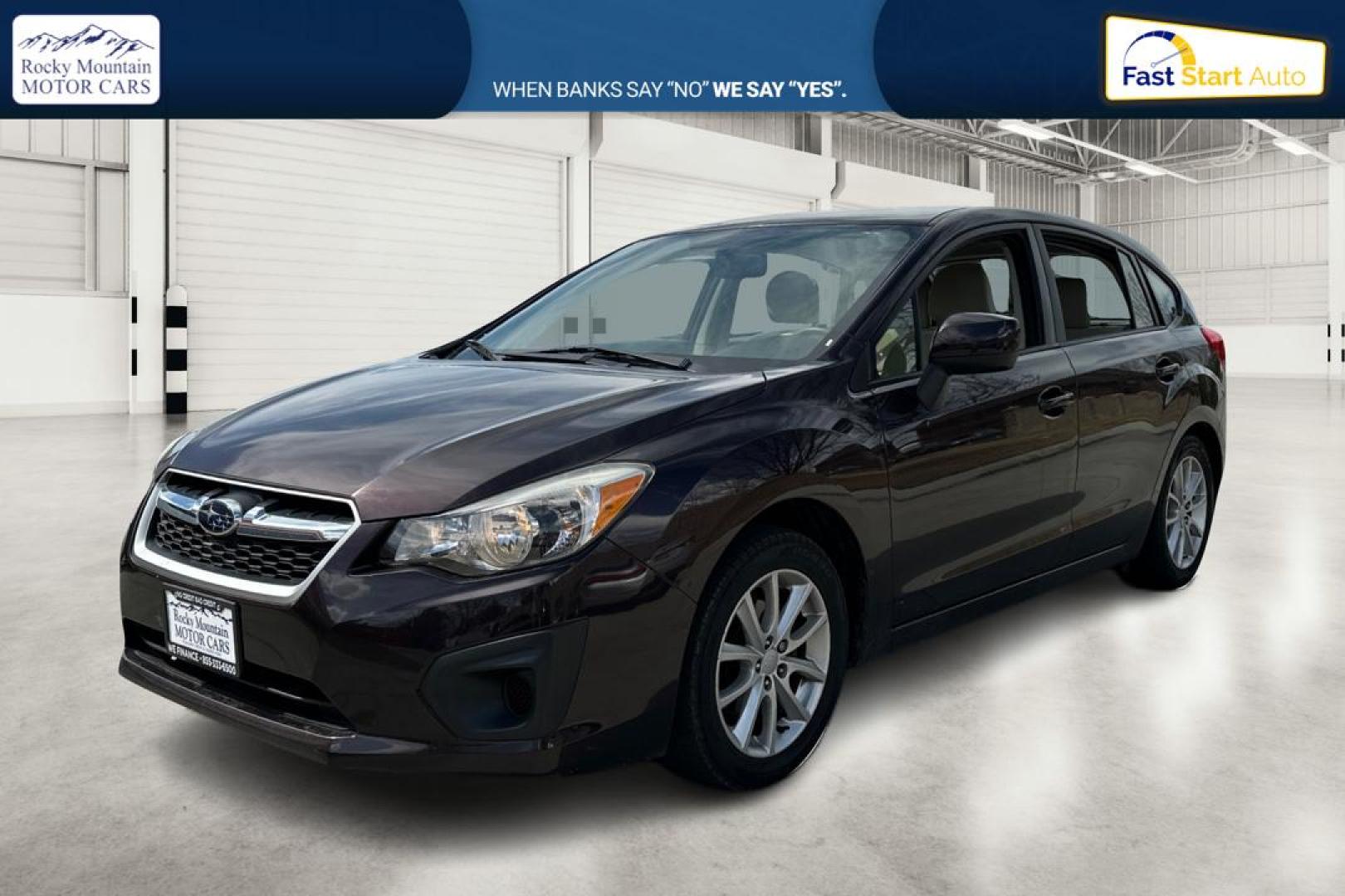2012 Purple Subaru Impreza Premium 5-Door (JF1GPAB69CG) with an 2.0L H4 DOHC 16V engine, Continuously Variable Transmission transmission, located at 767 S State Road, Pleasant Grove, UT, 84062, (801) 785-1058, 40.354839, -111.736687 - Photo#8