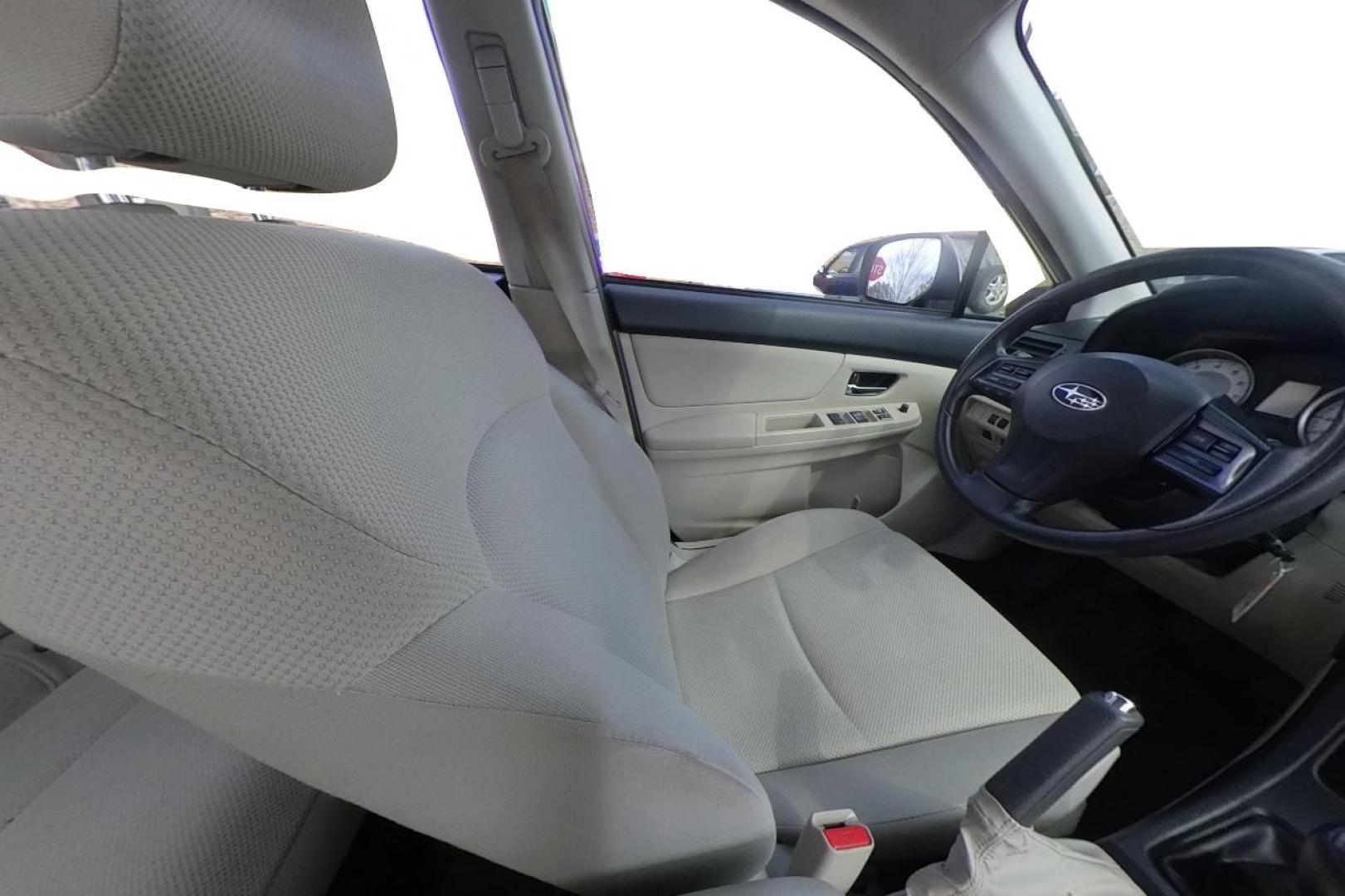 2012 Purple Subaru Impreza Premium 5-Door (JF1GPAB69CG) with an 2.0L H4 DOHC 16V engine, Continuously Variable Transmission transmission, located at 767 S State Road, Pleasant Grove, UT, 84062, (801) 785-1058, 40.354839, -111.736687 - Photo#17