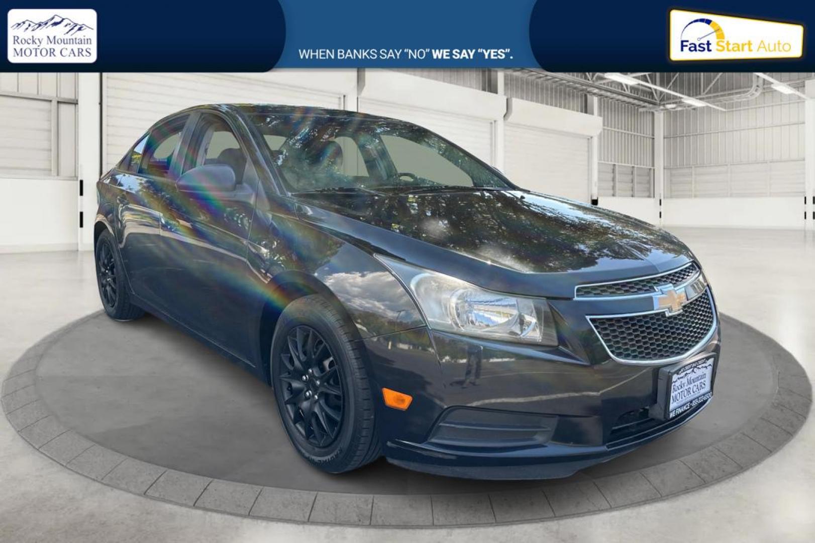 2013 Black Chevrolet Cruze LS Manual (1G1PB5SH3D7) with an 1.8L L4 DOHC 16V FFV engine, 6-Speed Manual transmission, located at 767 S State Road, Pleasant Grove, UT, 84062, (801) 785-1058, 40.354839, -111.736687 - Photo#0