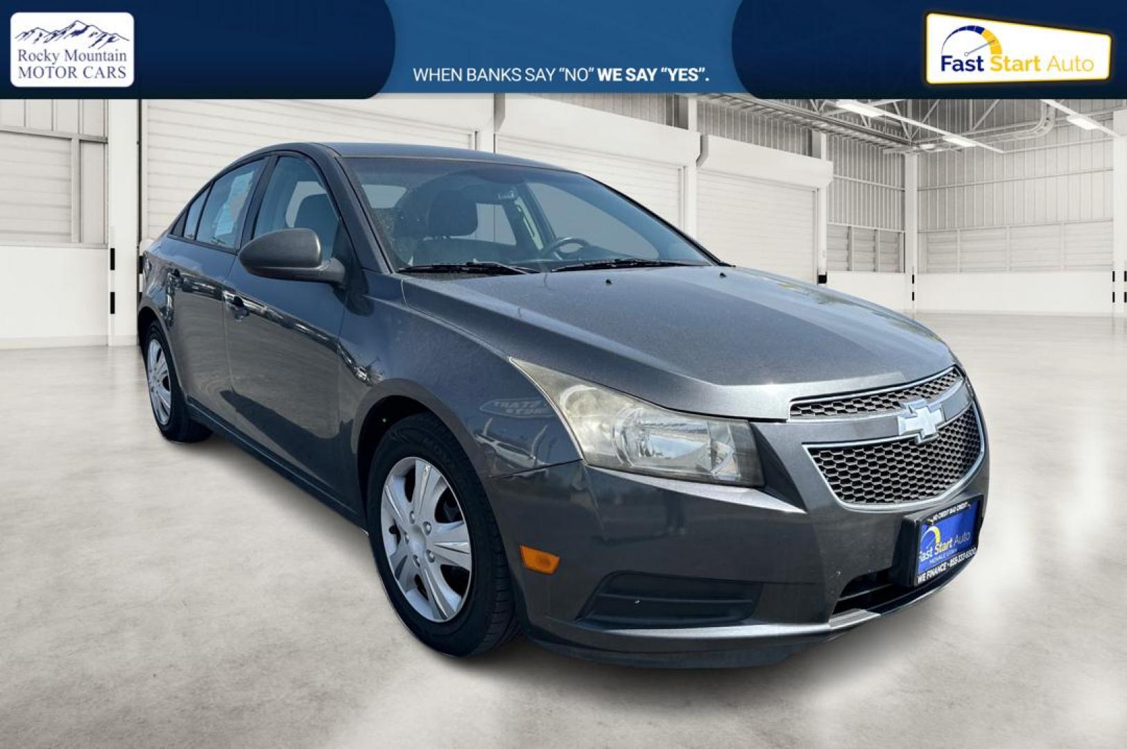 2013 Gray Chevrolet Cruze LS Auto (1G1PA5SGXD7) with an 1.8L L4 DOHC 16V engine, 6-Speed Automatic transmission, located at 344 S Washington Blvd, Ogden, UT, 84404, (801) 399-1799, 41.255482, -111.970848 - Photo#0