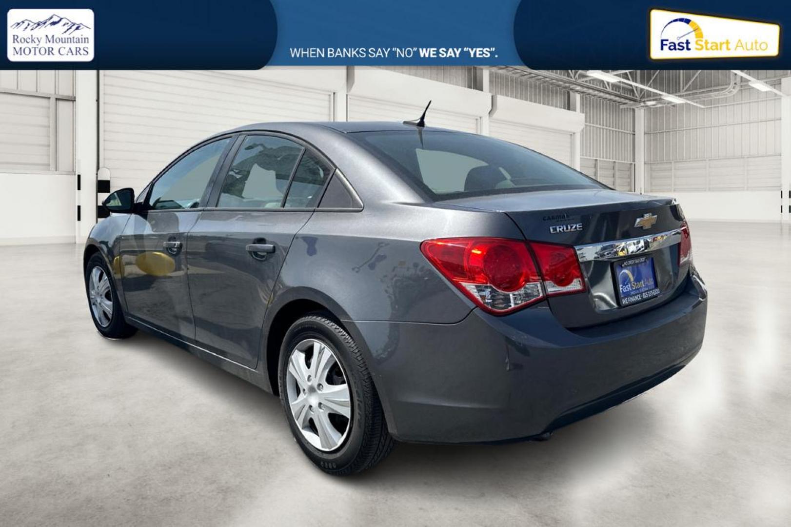 2013 Gray Chevrolet Cruze LS Auto (1G1PA5SGXD7) with an 1.8L L4 DOHC 16V engine, 6-Speed Automatic transmission, located at 344 S Washington Blvd, Ogden, UT, 84404, (801) 399-1799, 41.255482, -111.970848 - Photo#5