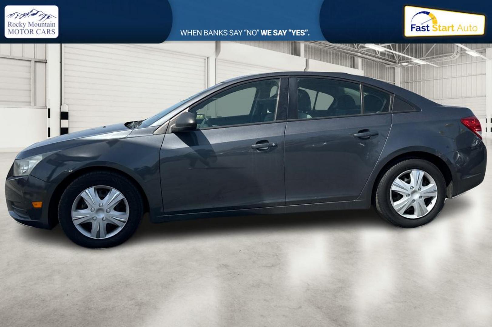 2013 Gray Chevrolet Cruze LS Auto (1G1PA5SGXD7) with an 1.8L L4 DOHC 16V engine, 6-Speed Automatic transmission, located at 344 S Washington Blvd, Ogden, UT, 84404, (801) 399-1799, 41.255482, -111.970848 - Photo#6