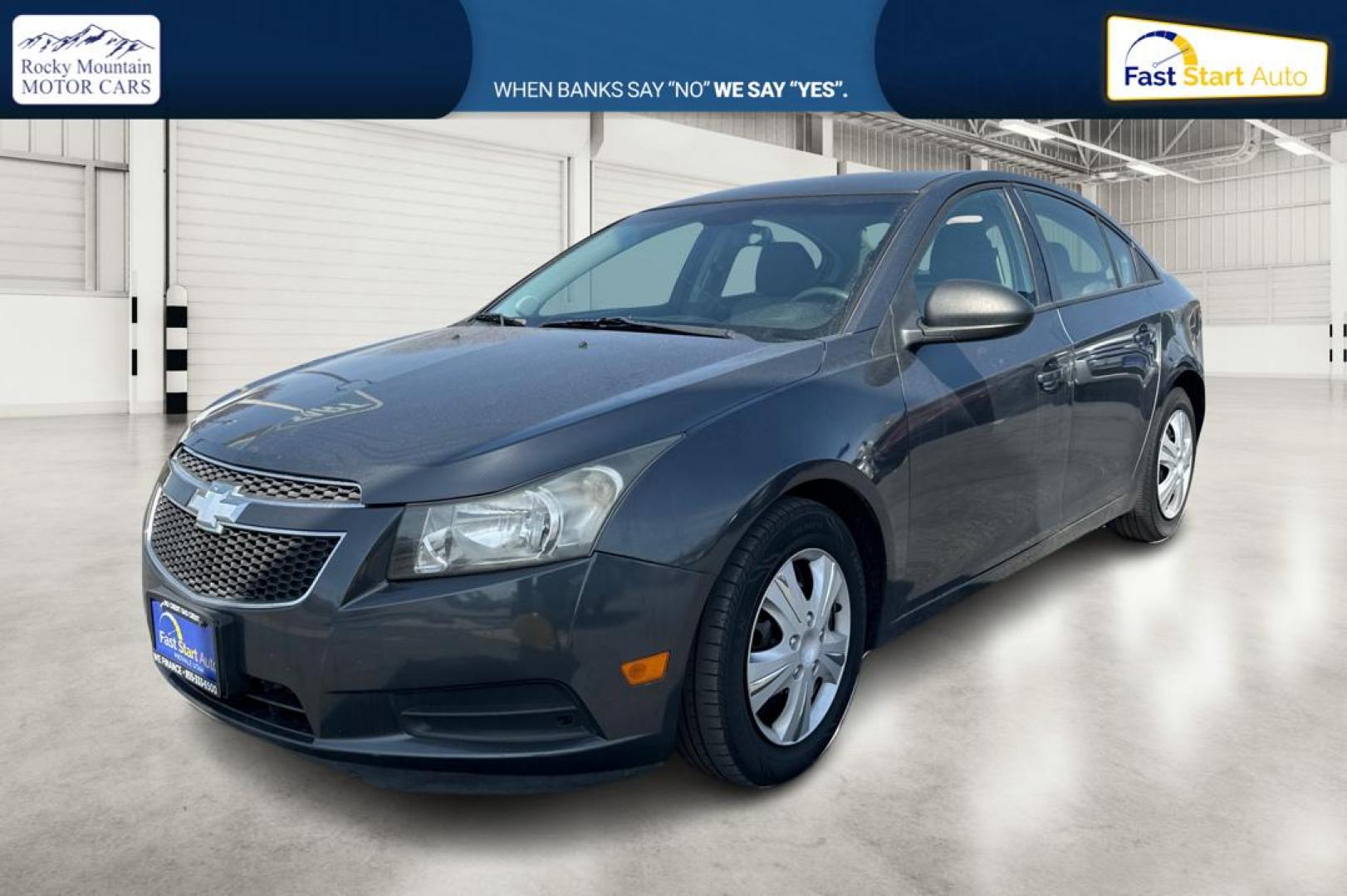 2013 Gray Chevrolet Cruze LS Auto (1G1PA5SGXD7) with an 1.8L L4 DOHC 16V engine, 6-Speed Automatic transmission, located at 344 S Washington Blvd, Ogden, UT, 84404, (801) 399-1799, 41.255482, -111.970848 - Photo#8