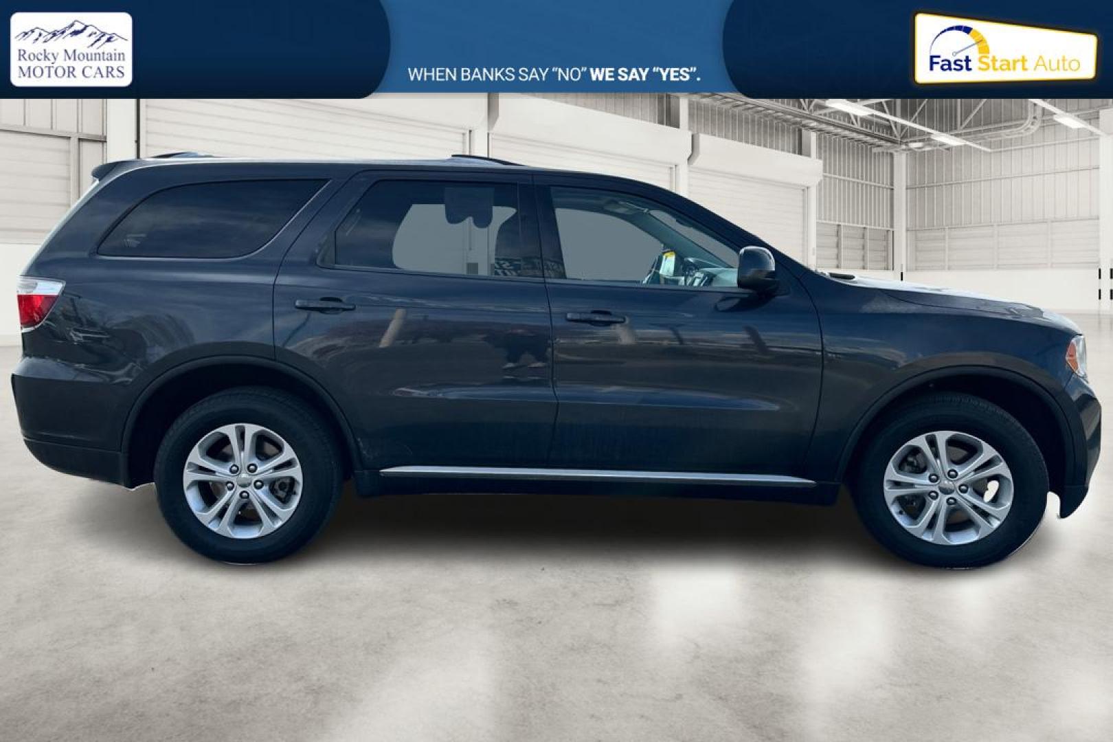 2013 Gray Dodge Durango SXT RWD (1C4RDHAG8DC) with an 3.6L V6 DOHC 24V engine, 5-Speed Automatic transmission, located at 767 S State Road, Pleasant Grove, UT, 84062, (801) 785-1058, 40.354839, -111.736687 - Photo#1