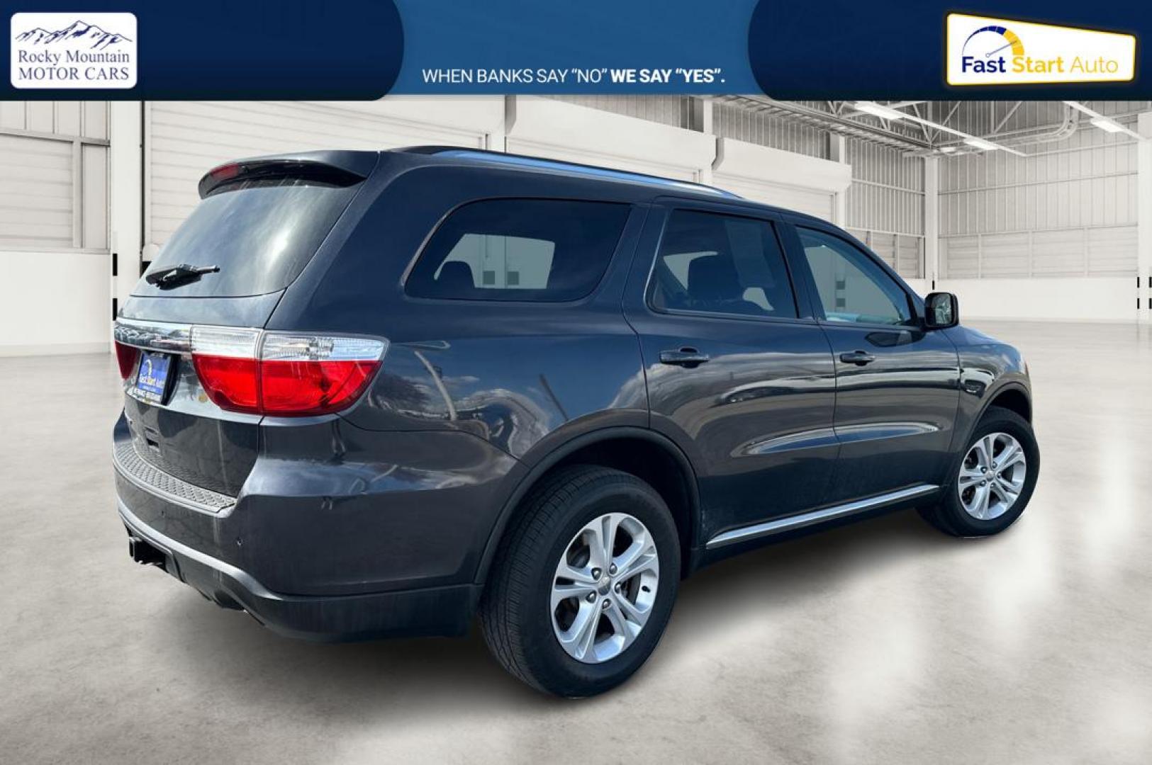 2013 Gray Dodge Durango SXT RWD (1C4RDHAG8DC) with an 3.6L V6 DOHC 24V engine, 5-Speed Automatic transmission, located at 767 S State Road, Pleasant Grove, UT, 84062, (801) 785-1058, 40.354839, -111.736687 - Photo#2