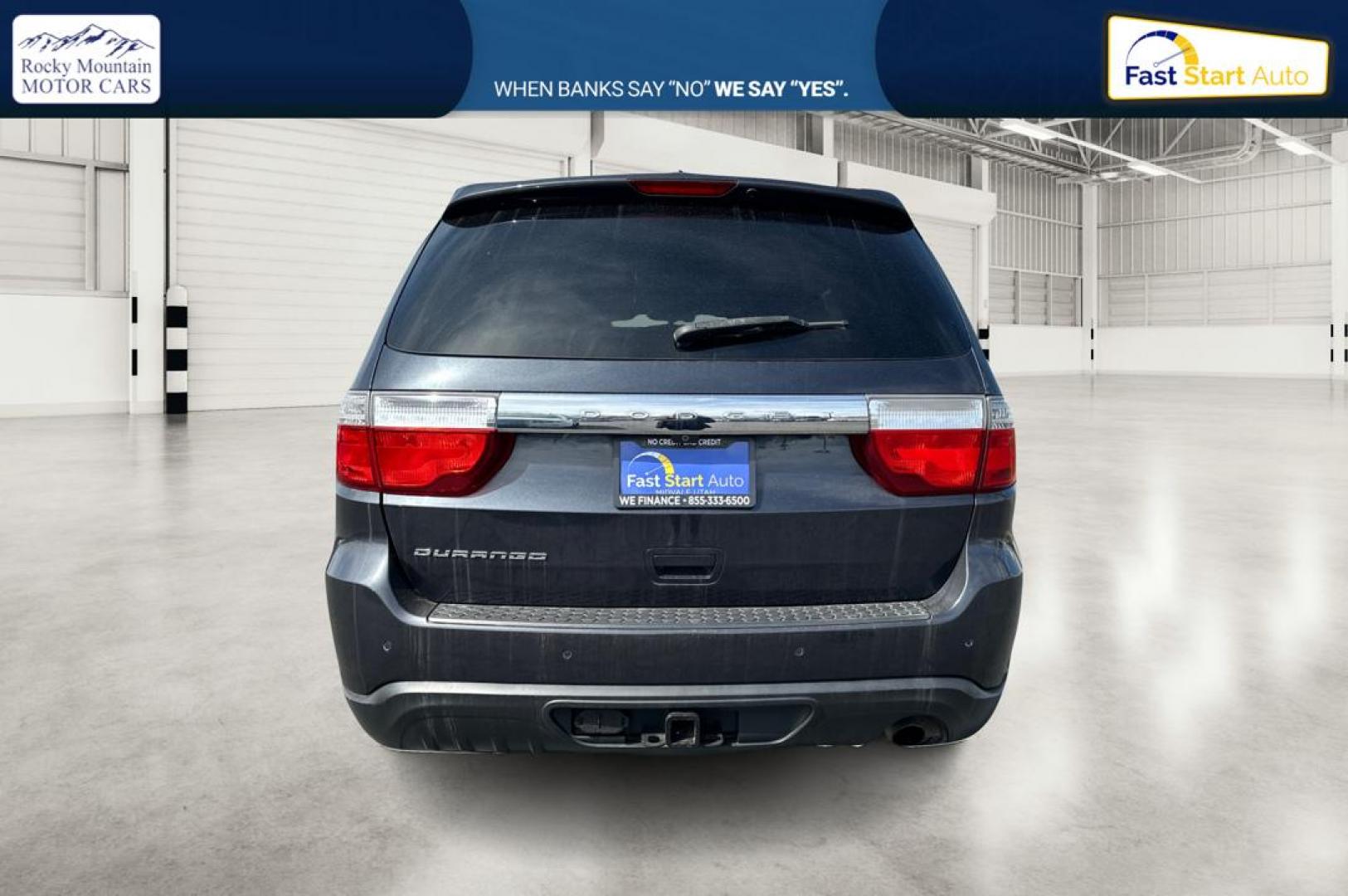 2013 Gray Dodge Durango SXT RWD (1C4RDHAG8DC) with an 3.6L V6 DOHC 24V engine, 5-Speed Automatic transmission, located at 767 S State Road, Pleasant Grove, UT, 84062, (801) 785-1058, 40.354839, -111.736687 - Photo#4