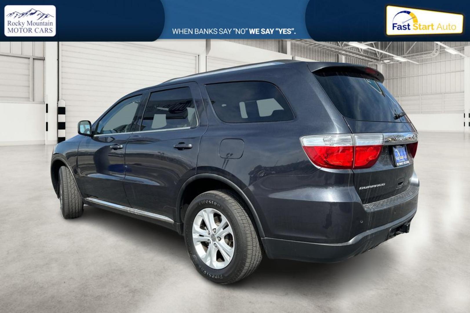 2013 Gray Dodge Durango SXT RWD (1C4RDHAG8DC) with an 3.6L V6 DOHC 24V engine, 5-Speed Automatic transmission, located at 767 S State Road, Pleasant Grove, UT, 84062, (801) 785-1058, 40.354839, -111.736687 - Photo#5