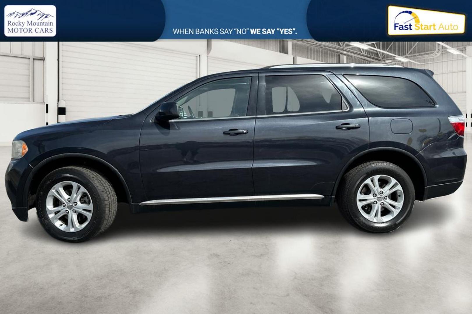2013 Gray Dodge Durango SXT RWD (1C4RDHAG8DC) with an 3.6L V6 DOHC 24V engine, 5-Speed Automatic transmission, located at 767 S State Road, Pleasant Grove, UT, 84062, (801) 785-1058, 40.354839, -111.736687 - Photo#6
