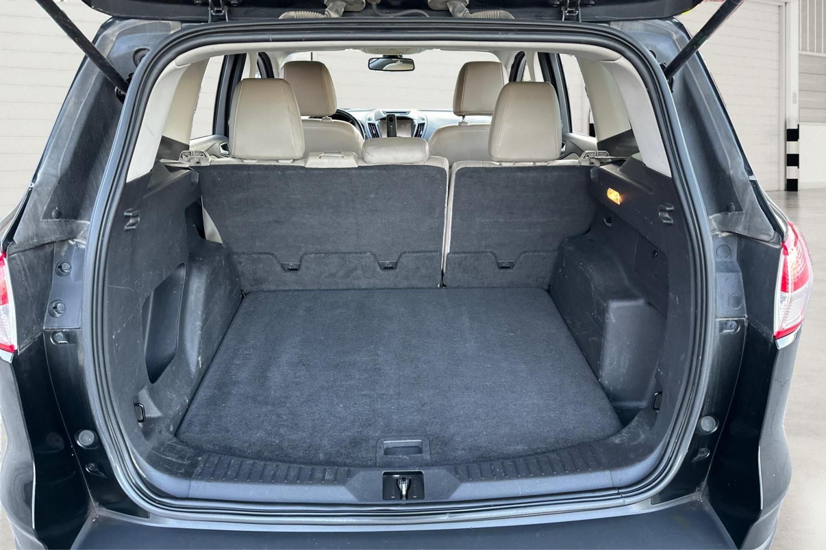 2013 Black Ford Escape SEL 4WD (1FMCU9H91DU) with an 2.0L L4 DOHC 16V engine, 6-Speed Automatic transmission, located at 7755 State Street, Midvale, UT, 84047, (801) 753-9063, 40.610329, -111.890656 - Photo#10