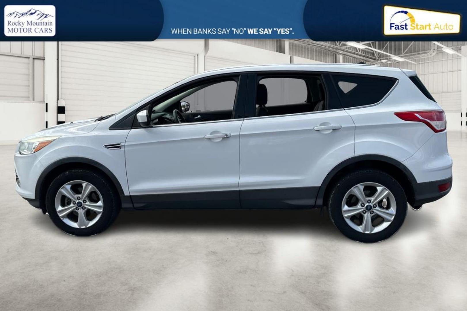 2013 White Ford Escape SE FWD (1FMCU0GX0DU) with an 1.6L L4 DOHC 16V engine, 6-Speed Automatic transmission, located at 7755 State Street, Midvale, UT, 84047, (801) 753-9063, 40.610329, -111.890656 - Photo#6