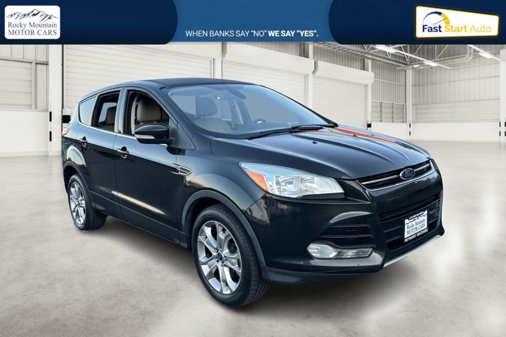 2013 Black Ford Escape SEL 4WD (1FMCU9H91DU) with an 2.0L L4 DOHC 16V engine, 6-Speed Automatic transmission, located at 7755 State Street, Midvale, UT, 84047, (801) 753-9063, 40.610329, -111.890656 - Photo#0