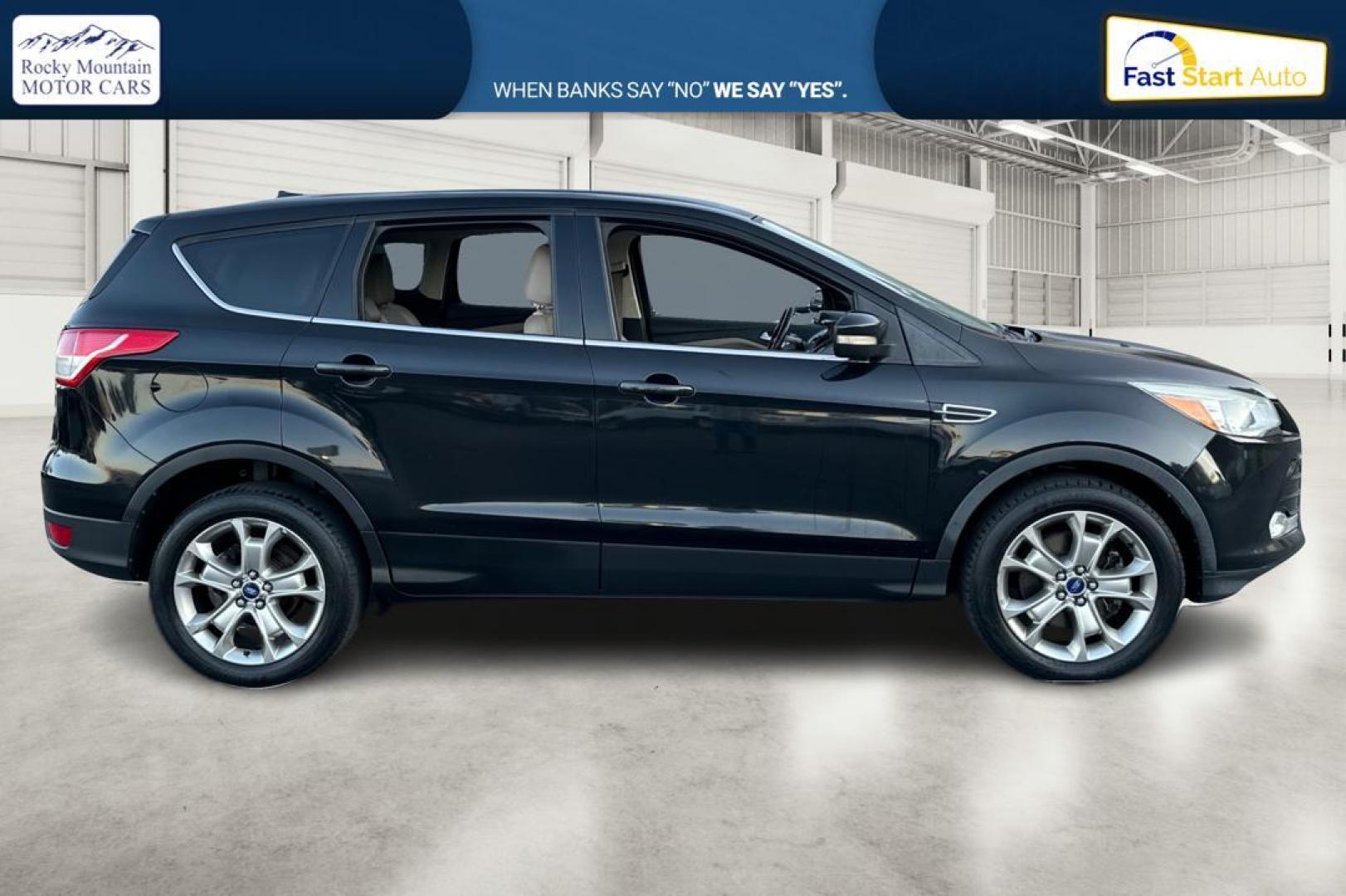 2013 Black Ford Escape SEL 4WD (1FMCU9H91DU) with an 2.0L L4 DOHC 16V engine, 6-Speed Automatic transmission, located at 7755 State Street, Midvale, UT, 84047, (801) 753-9063, 40.610329, -111.890656 - Photo#1