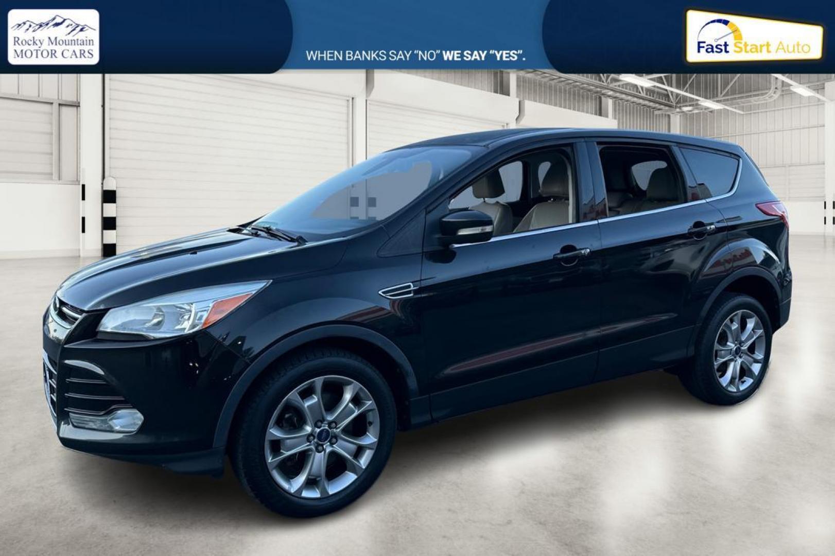 2013 Black Ford Escape SEL 4WD (1FMCU9H91DU) with an 2.0L L4 DOHC 16V engine, 6-Speed Automatic transmission, located at 7755 State Street, Midvale, UT, 84047, (801) 753-9063, 40.610329, -111.890656 - Photo#6