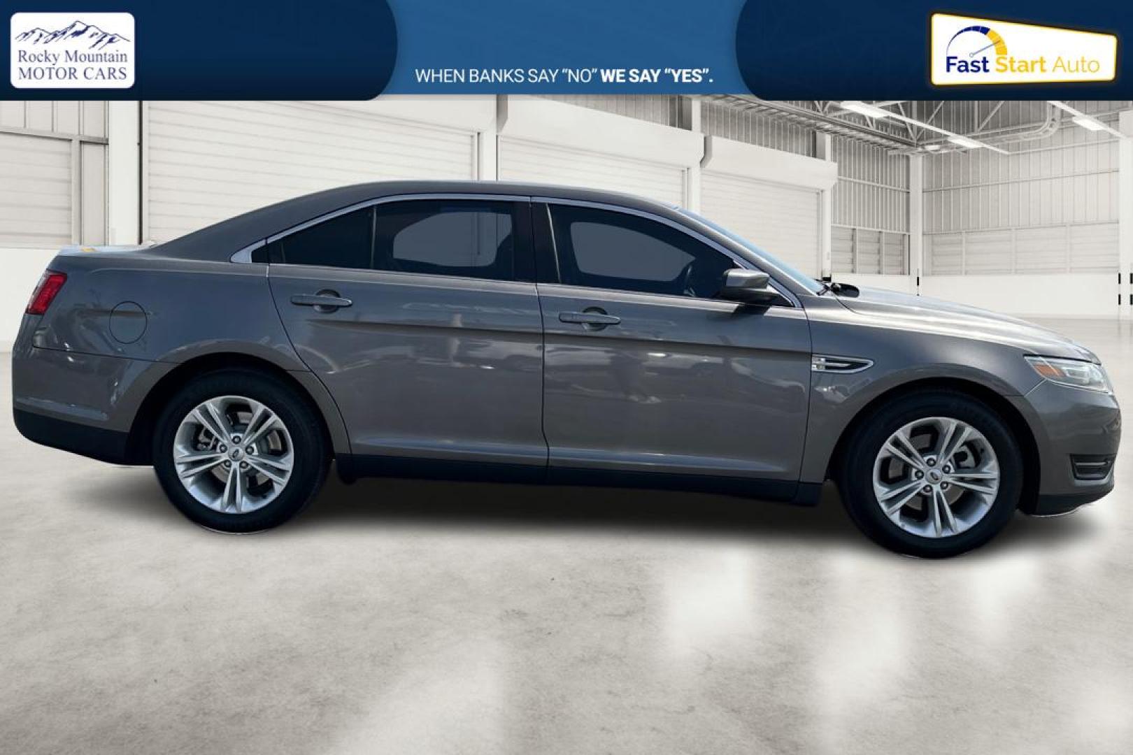 2013 Gray Ford Taurus SEL FWD (1FAHP2E87DG) with an 3.5L V6 DOHC 24V engine, 6-Speed Automatic transmission, located at 7755 State Street, Midvale, UT, 84047, (801) 753-9063, 40.610329, -111.890656 - Photo#1