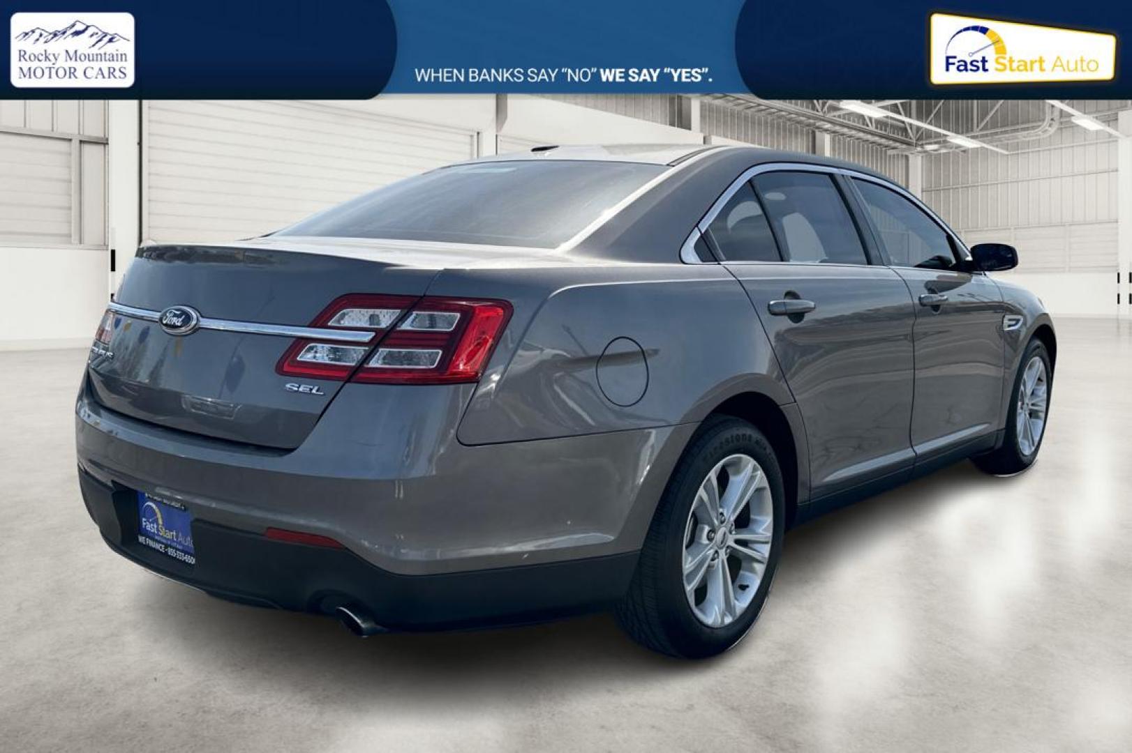 2013 Gray Ford Taurus SEL FWD (1FAHP2E87DG) with an 3.5L V6 DOHC 24V engine, 6-Speed Automatic transmission, located at 7755 State Street, Midvale, UT, 84047, (801) 753-9063, 40.610329, -111.890656 - Photo#2