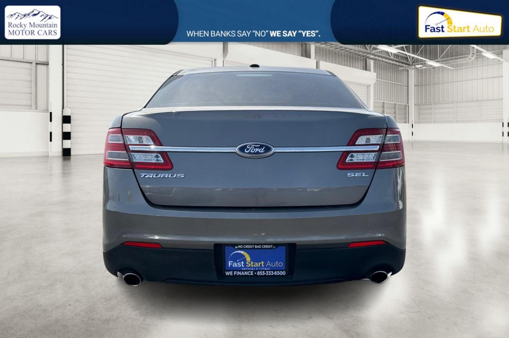 2013 Gray Ford Taurus SEL FWD (1FAHP2E87DG) with an 3.5L V6 DOHC 24V engine, 6-Speed Automatic transmission, located at 7755 State Street, Midvale, UT, 84047, (801) 753-9063, 40.610329, -111.890656 - Photo#4