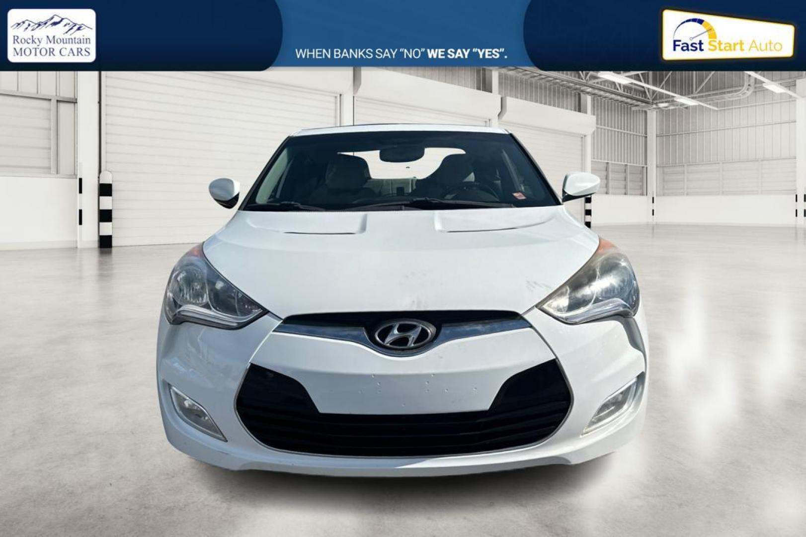 2013 White Hyundai Veloster Base (KMHTC6AD4DU) with an 1.6L L4 DOHC 16V engine, Auto, 6-Spd EcoShft DCT transmission, located at 7755 State Street, Midvale, UT, 84047, (801) 753-9063, 40.610329, -111.890656 - Photo#9