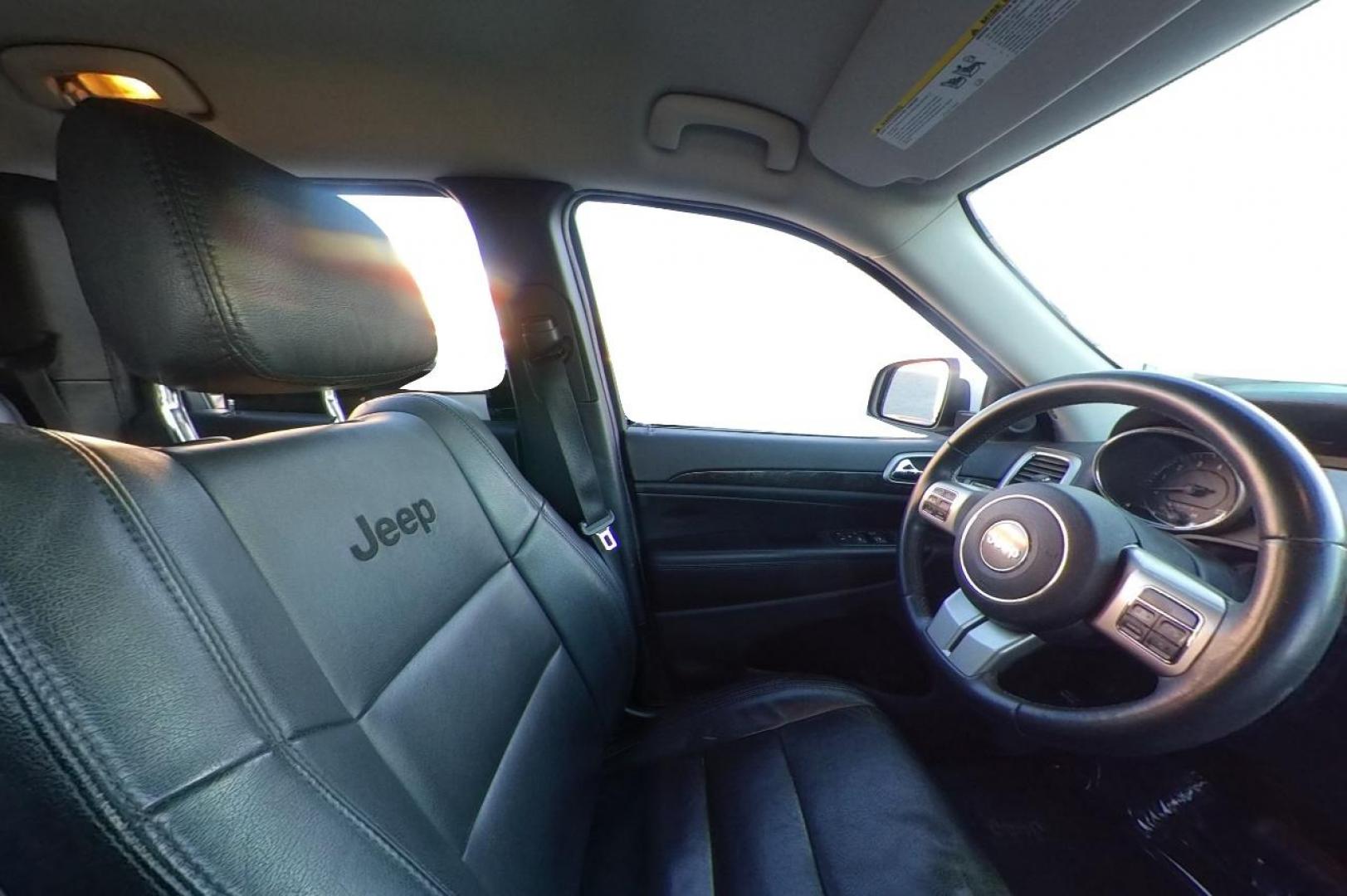 2013 White Jeep Grand Cherokee Laredo 2WD (1C4RJEAG6DC) with an 3.6L V6 DOHC 24V engine, 5-Speed Automatic transmission, located at 7755 State Street, Midvale, UT, 84047, (801) 753-9063, 40.610329, -111.890656 - Photo#17
