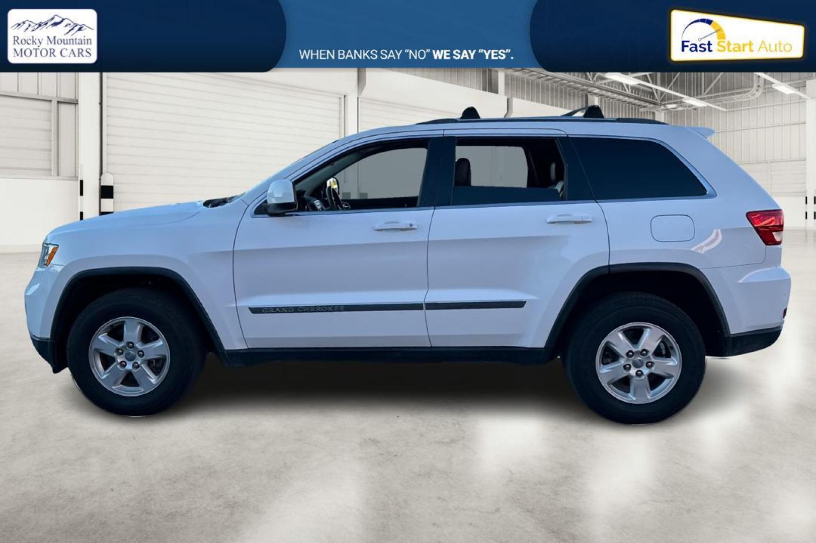 2013 White Jeep Grand Cherokee Laredo 2WD (1C4RJEAG6DC) with an 3.6L V6 DOHC 24V engine, 5-Speed Automatic transmission, located at 7755 State Street, Midvale, UT, 84047, (801) 753-9063, 40.610329, -111.890656 - Photo#6